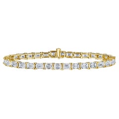Bracelet ligne en or jaune 18 carats avec diamants taillés en émeraude