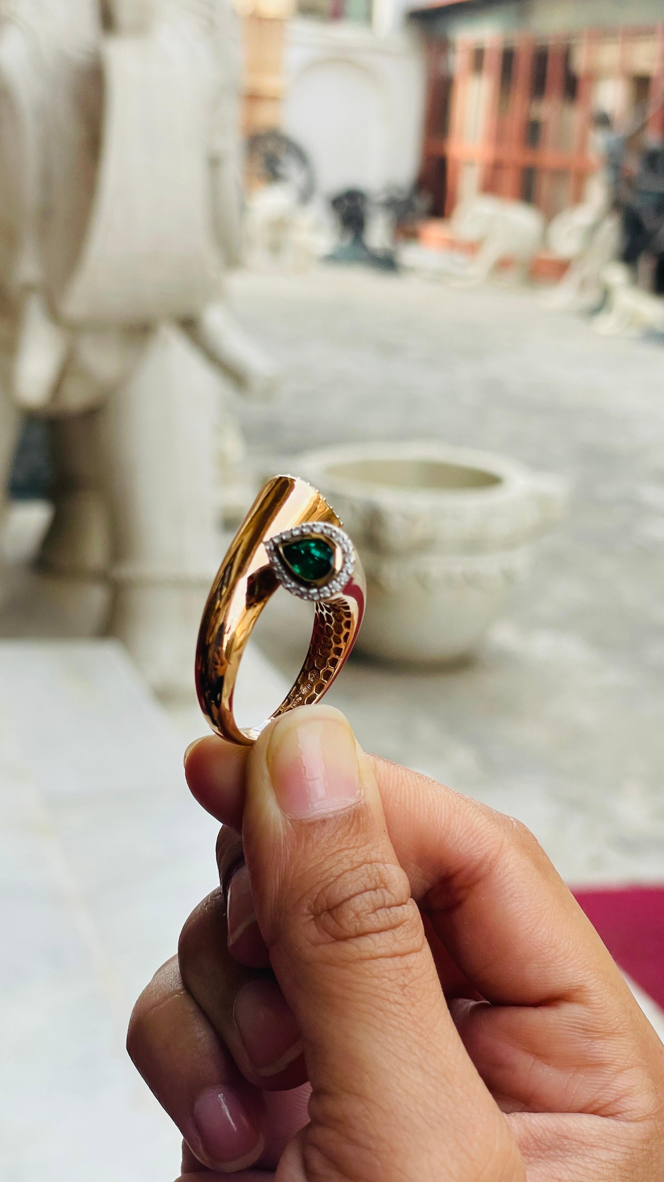For Sale:  Unique 18k Solid Yellow Gold Emerald and Diamond Bypass Ring 11