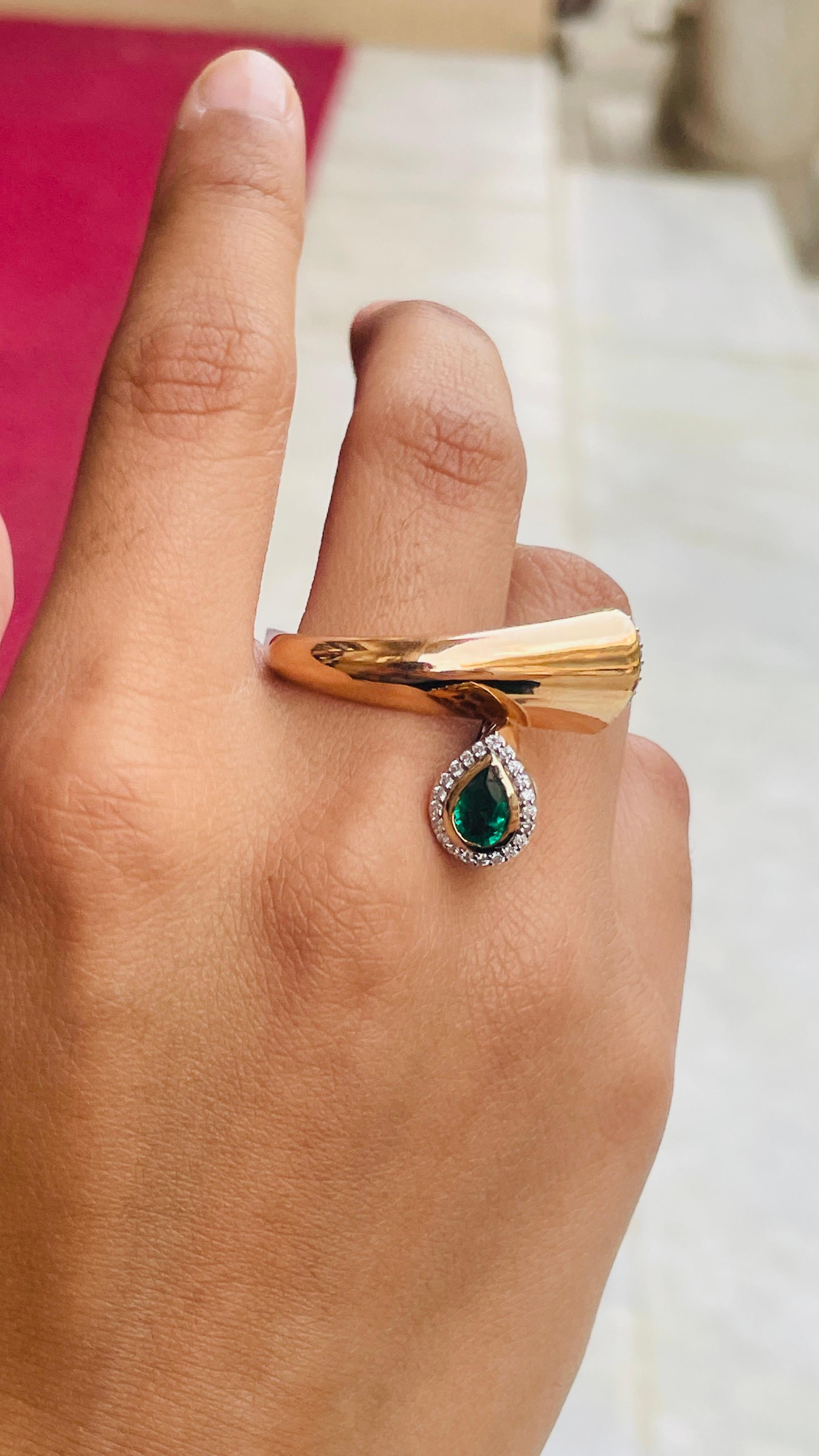 For Sale:  Unique 18k Solid Yellow Gold Emerald and Diamond Bypass Ring 6