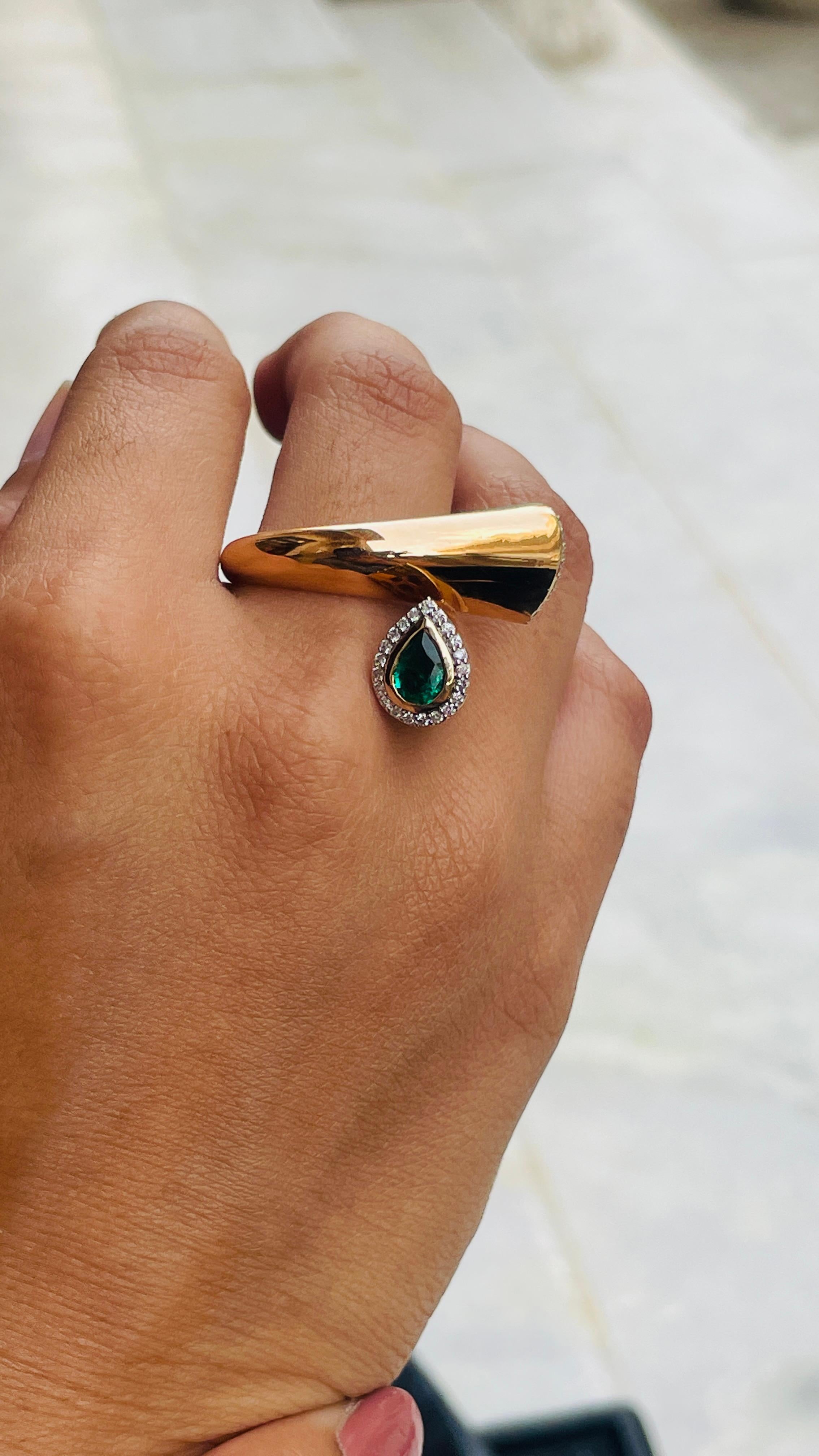 For Sale:  Unique 18k Solid Yellow Gold Emerald and Diamond Bypass Ring 9