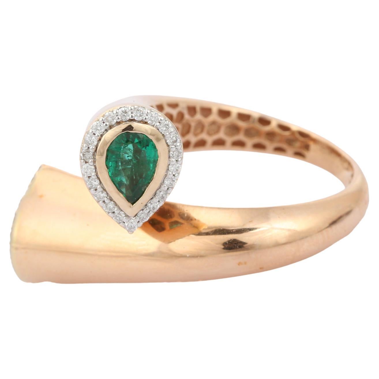 For Sale:  Unique 18k Solid Yellow Gold Emerald and Diamond Bypass Ring