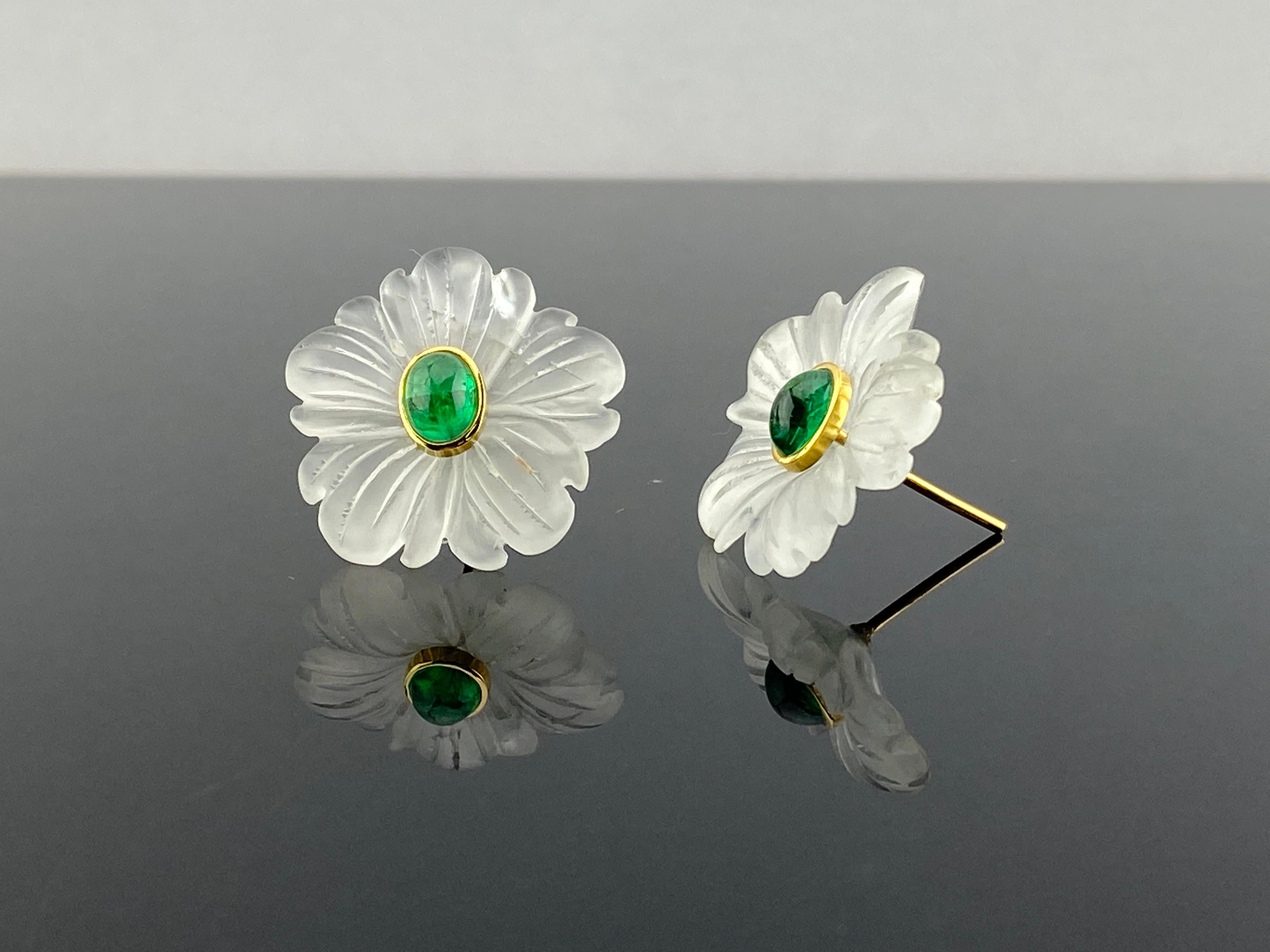 This earring is made from rock crystal as the petals of the flower and has emeralds set into the center with 18K gold. This pair of earrings adds another floral element of to your summer outfits as its great for daytime wear with just casual