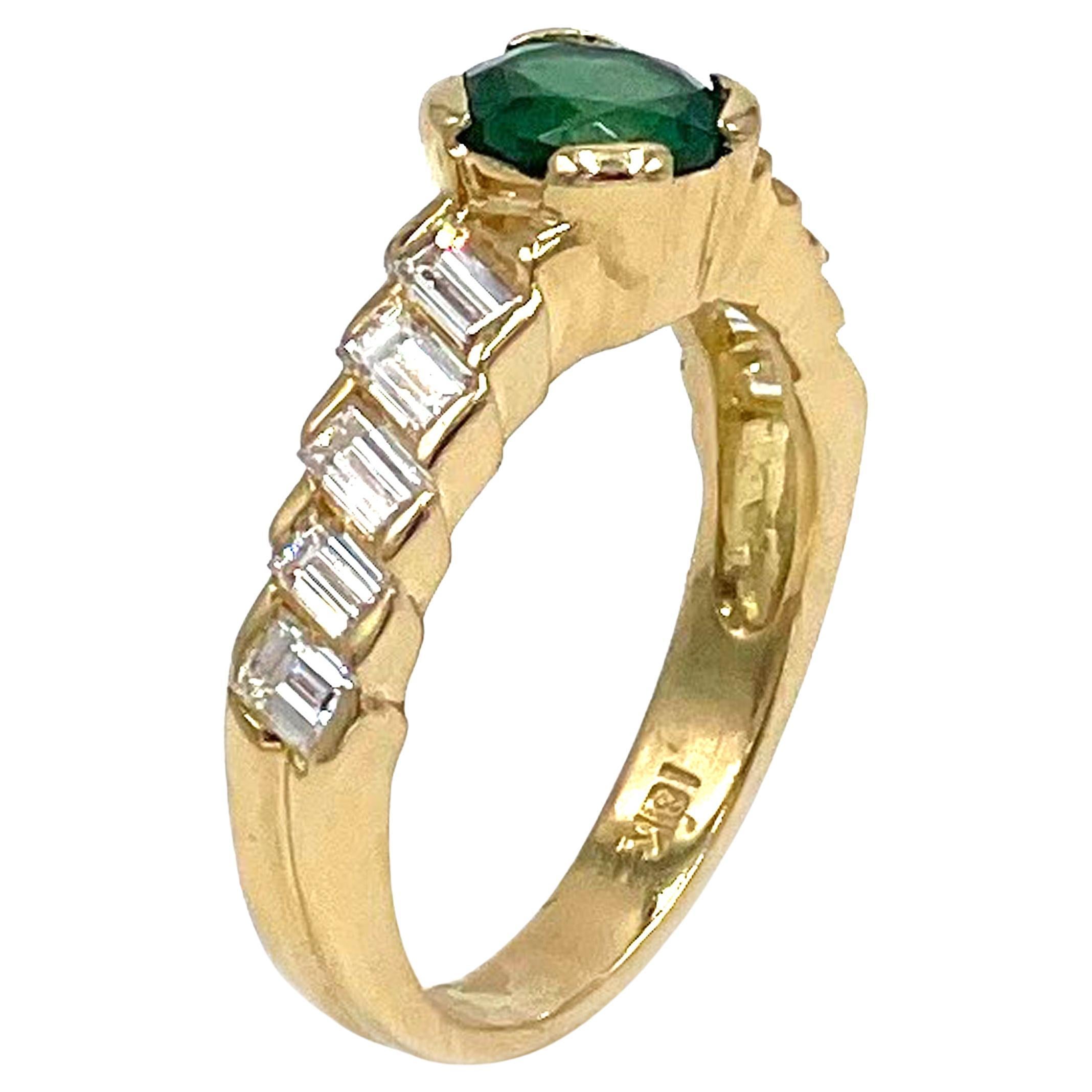 18K Yellow Gold Emerald Ring with Baguette Diamonds For Sale