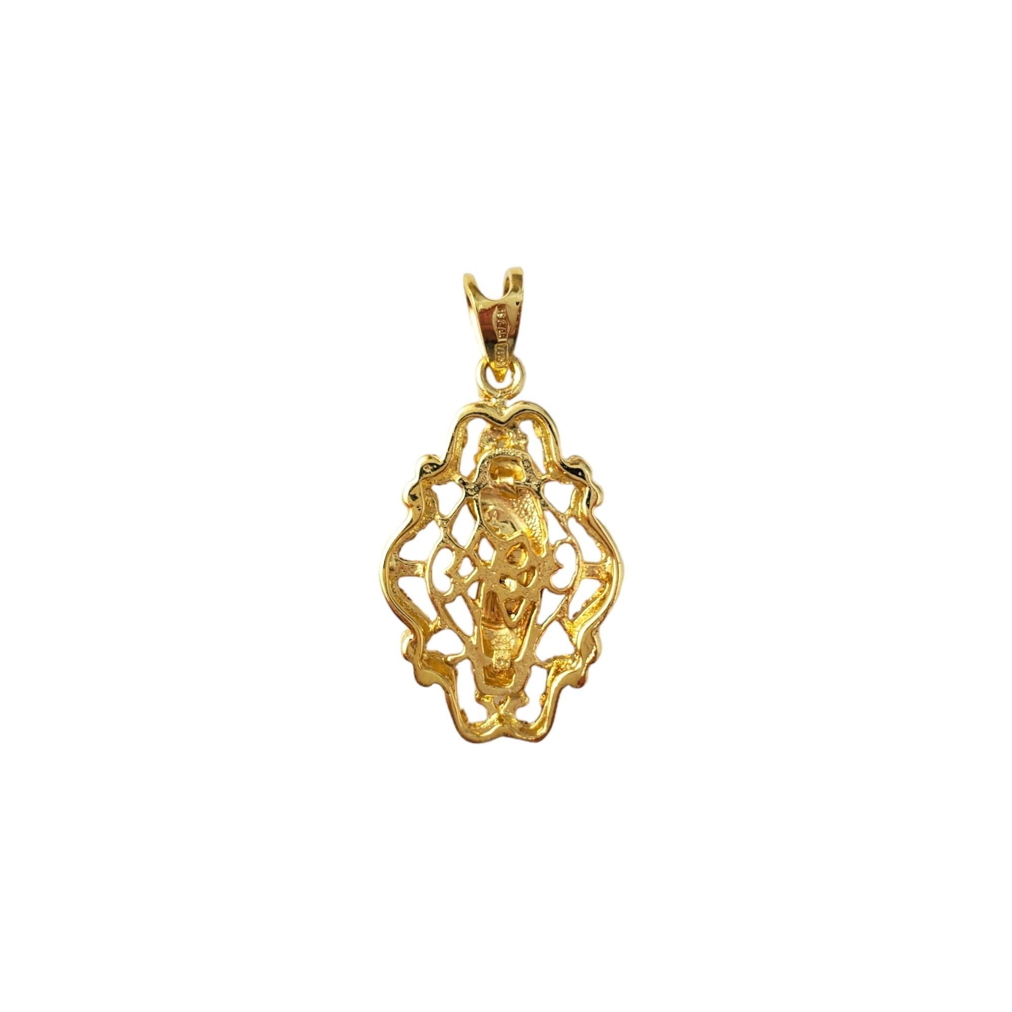 Vintage 18K Yellow Gold & Enamel Blessed Mother Pendant - 

This piece of jewelry signifies protection, faith and guidance. 

Pendant is set in yellow gold with blue and green enamel accents.

Size:  24.86mm X 16.04mm

Weight:  2.1 dwt. /  3.27