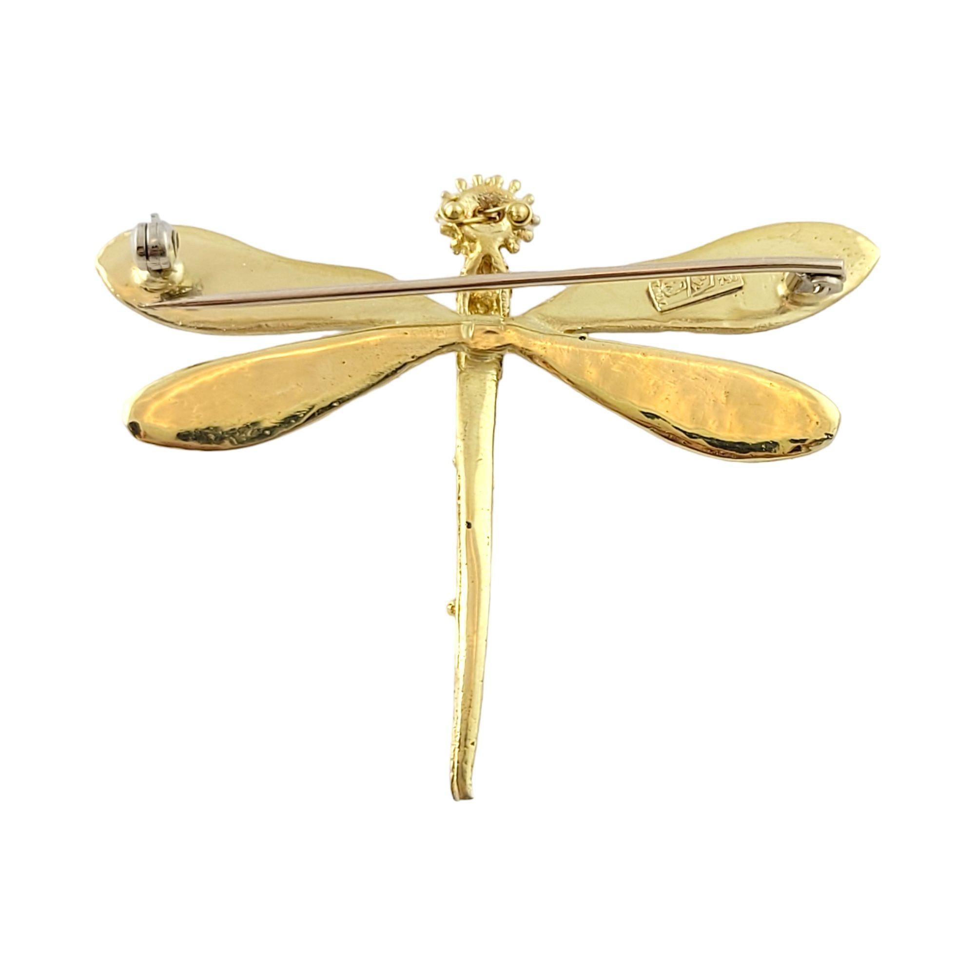 Vintage 18K Yellow Gold & Enamel Dragonfly Pin

Gorgeous 18K gold dragonfly pin with beautiful enamel wings and 2 pearls as eyes!

2 Pearls: 3mm each

Size: 44mm X 54mm X 6mm

Weight: 11.7 g/ 7.5 dwt

Hallmark: Italy AL419 K18 750

Very good