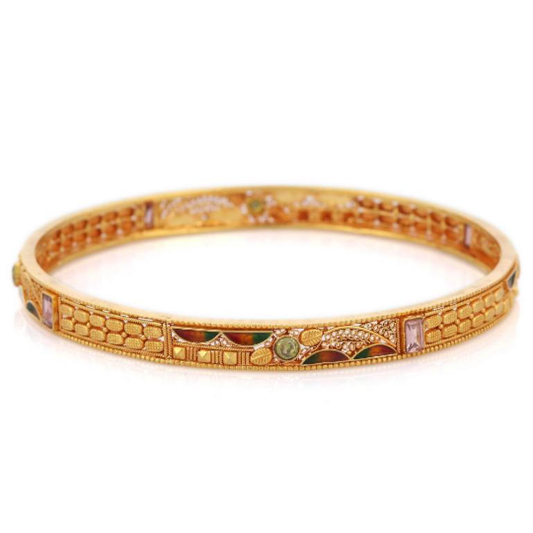 Enameled Bangle in 18K Gold. It’s a great jewelry ornament to wear on occasions and at the same time works as a wonderful gift for your loved ones. These lovely statement pieces are perfect generation jewelry to pass on.
Bangles feel comfortable