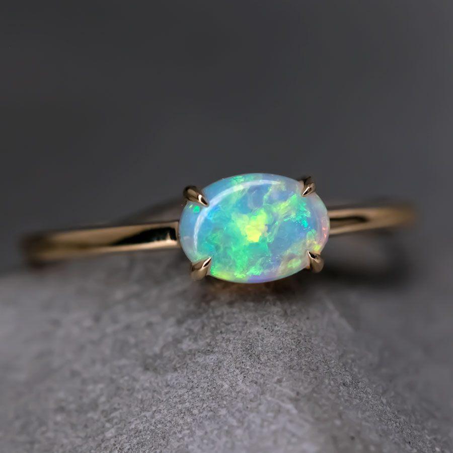 18K Yellow Gold Engagement Ring featuring an Oval Australian Solid Opal.


Free Domestic USPS First Class Shipping!  Free One Year Limited Warranty!  Free Gift Bag or Box with every order!



Opal—the queen of gemstones, is one of the most beautiful