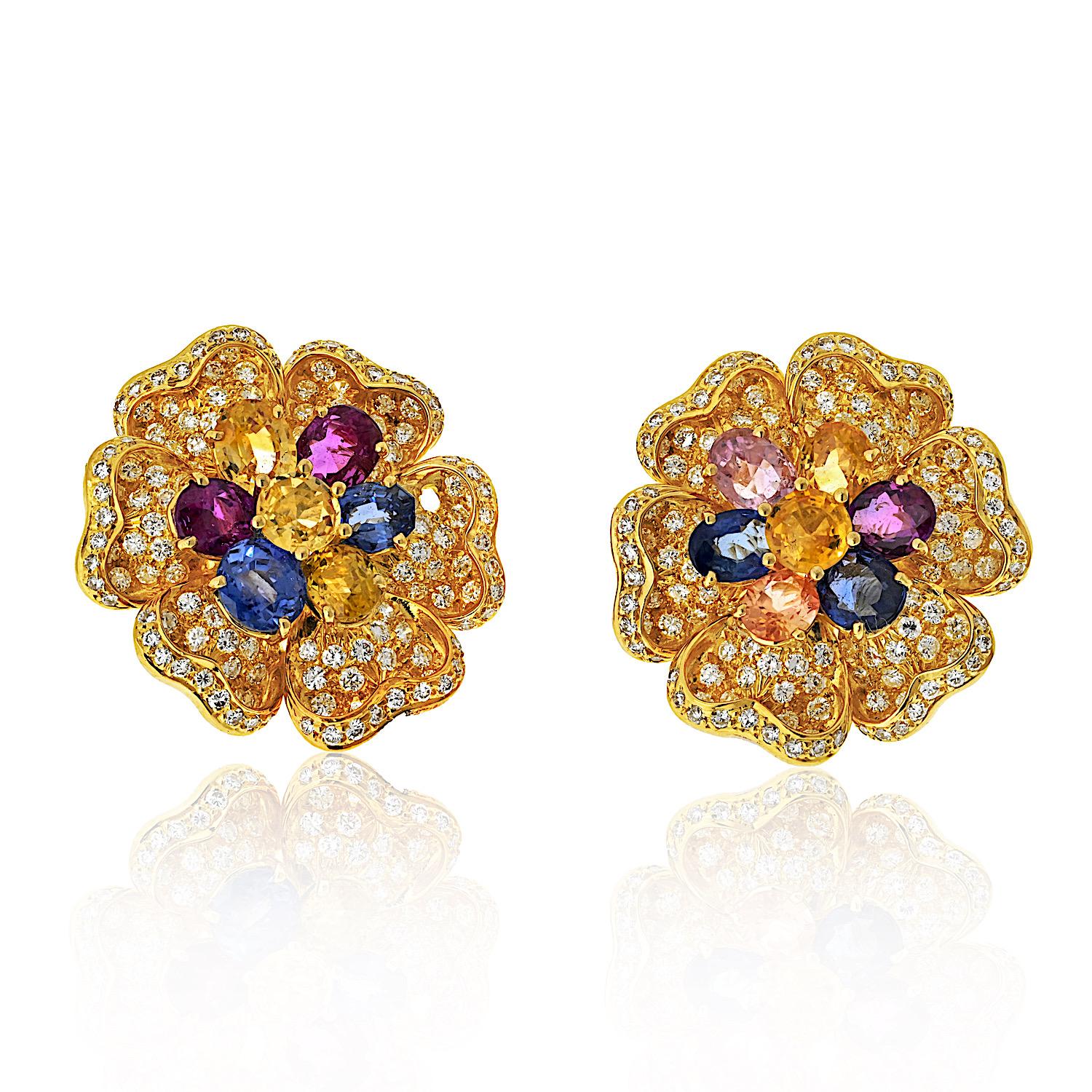 The estate 18K yellow gold diamond and multicolor sapphire flower earrings are exquisite pieces, designed to add a touch of elegance and color to any ensemble. Here are the details:

- **Material:** 18K yellow gold
- **Dimensions:** 3 cm wide
-