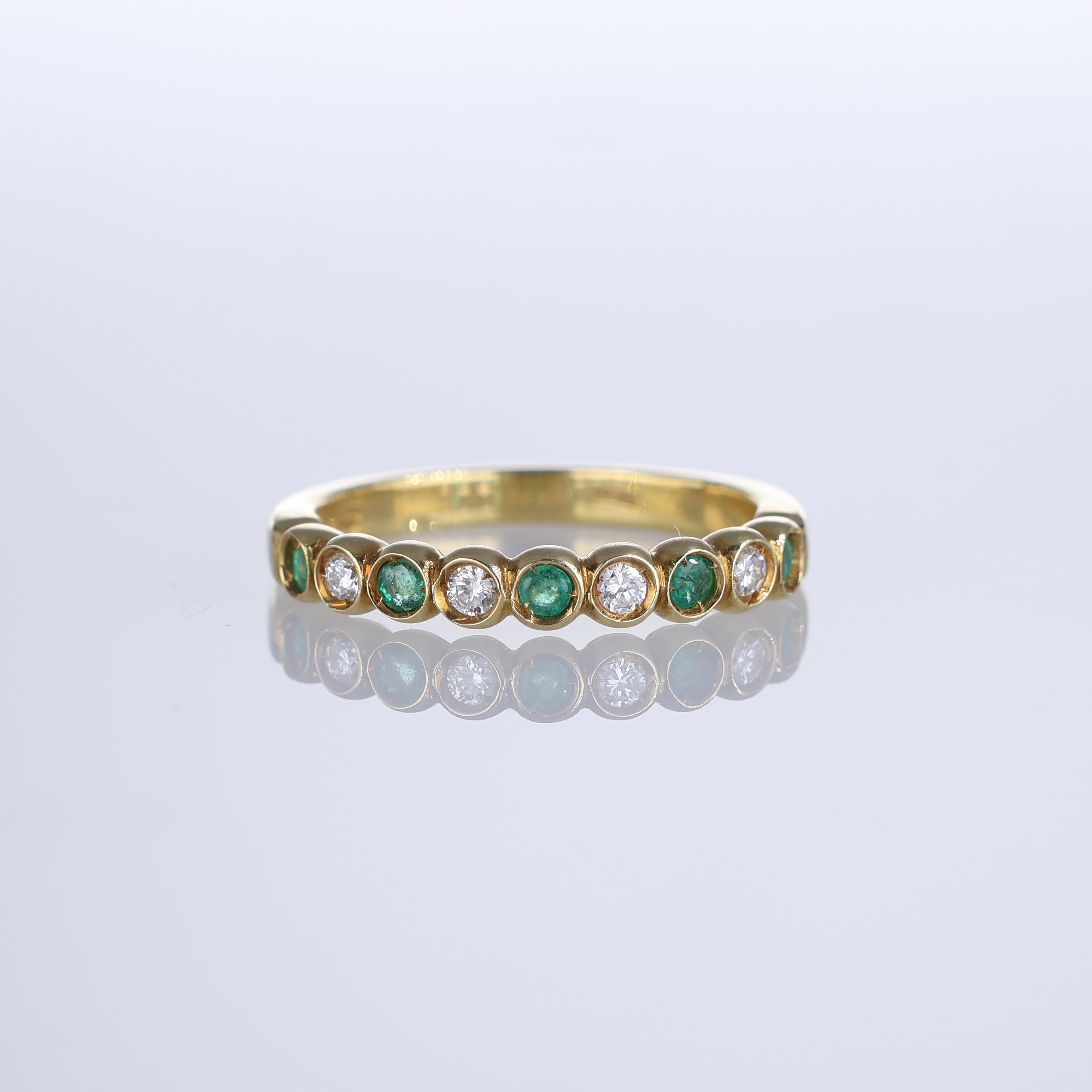 IMPORTANT NOTE:
✔ No additional costs will be added to this order.
✔ Shipping and customs duties are fully covered by us.
--------------------
A refined 18k yellow gold eternity band featuring alternating round-cut emeralds and brilliant-cut