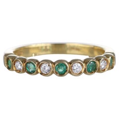 18k Yellow Gold Eternity Band with Emeralds and Diamonds