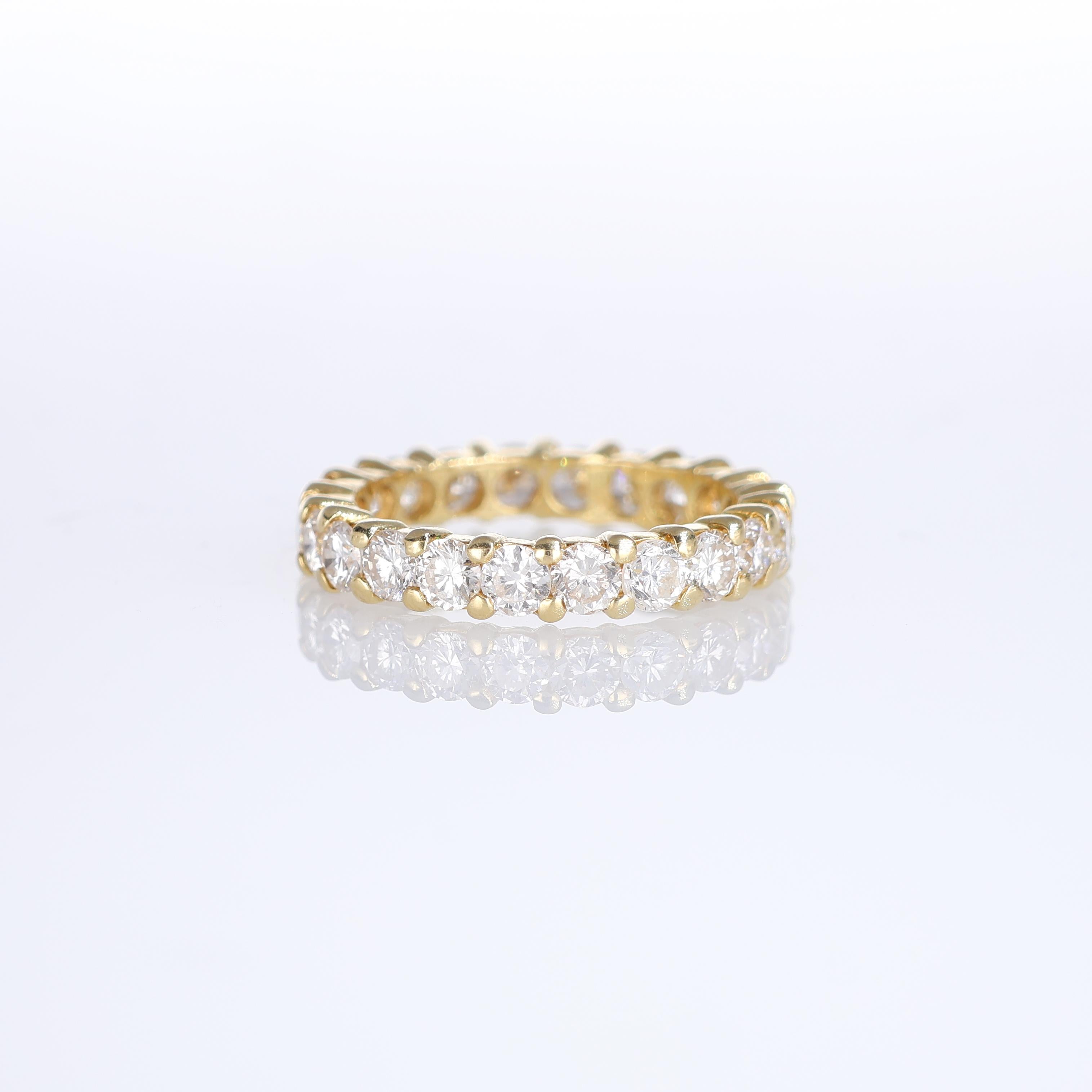 IMPORTANT NOTE:
✔ No additional costs will be added to this order.
✔ Shipping and customs duties are fully covered by us.
--------------------
This elegant eternity ring crafted in 18K yellow gold is adorned with dazzling natural white brilliant-cut