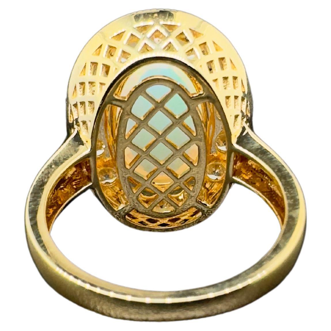 Contemporary 18k Yellow Gold Ethiopian Opal Ring with Diamonds For Sale