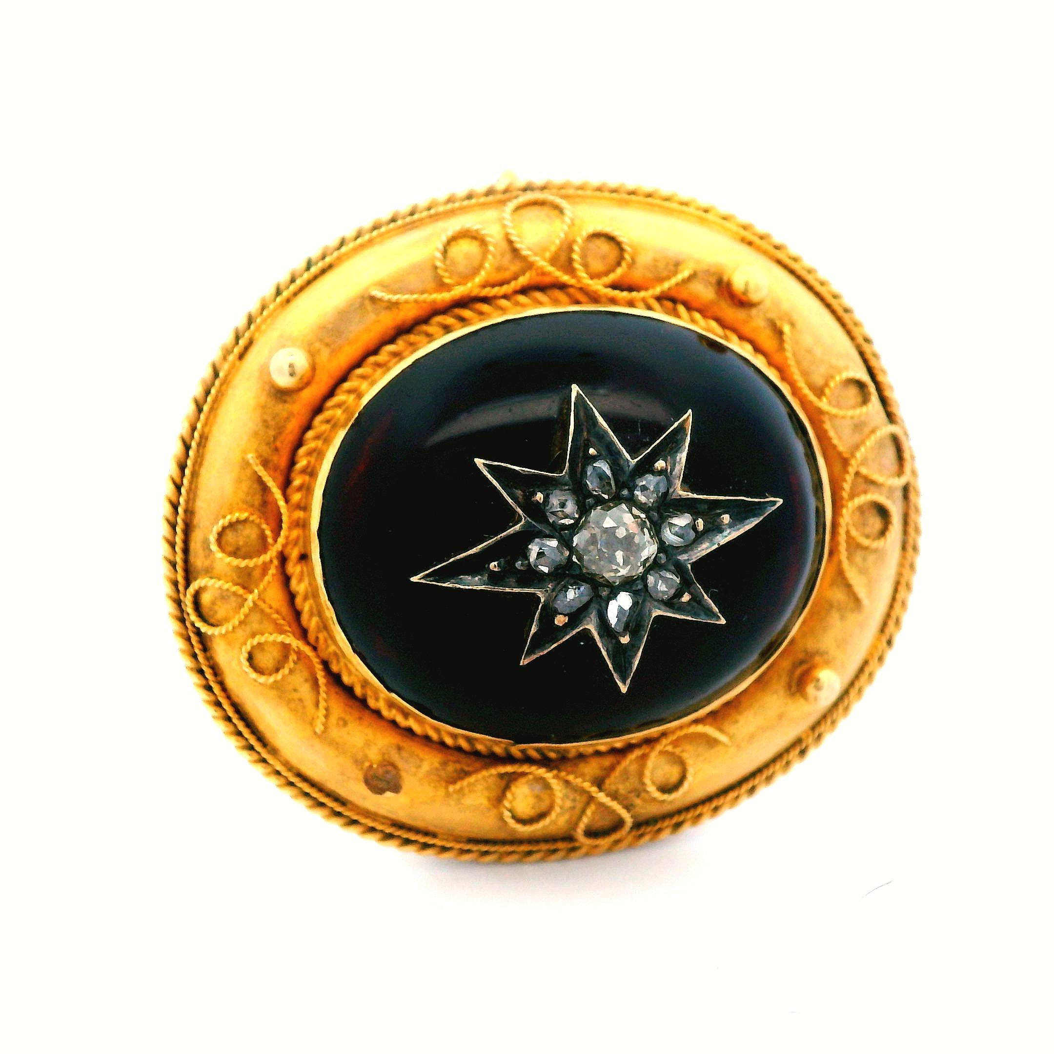 This gorgeous Etruscan pin is made in 18k yellow gold and features both garnet and diamond. This pin comes in great condition overall, however, one of the 4 gold beads is missing. This would be an easy fix for someone willing to spend the time to