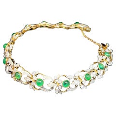 Bracelet exquis en or jaune 18k avec émeraudes et diamants