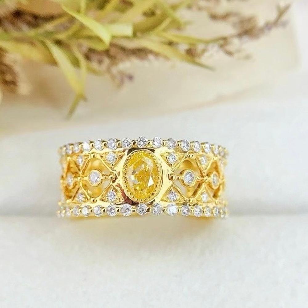 18K Yellow Gold Fancy Yellow Diamond & Diamond Lace Ring

1 Fancy Yellow Diamond - 0.42 CT
Diamonds - 0.85 CT
18K Gold - 5.31 GM