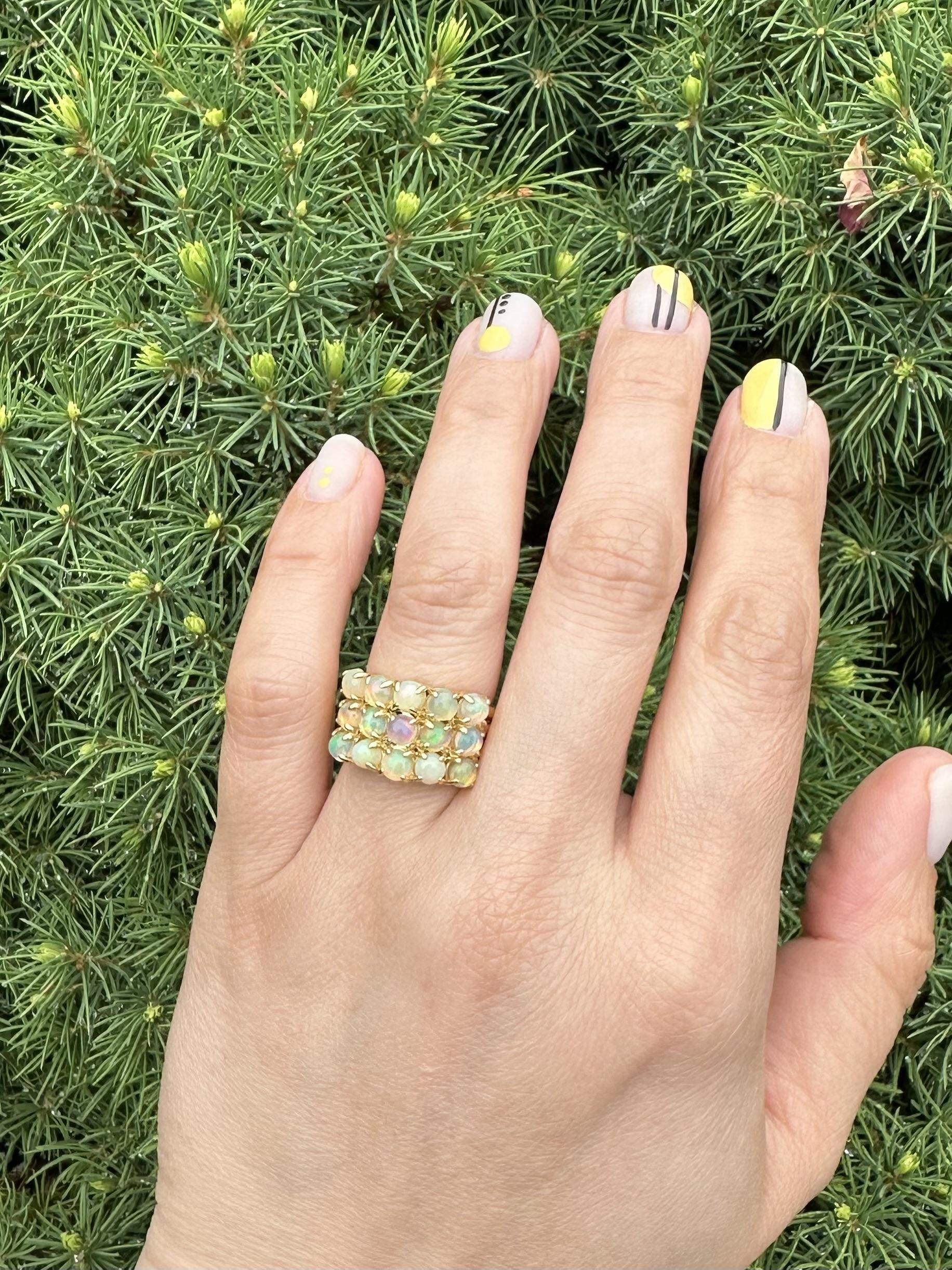 --Stone(s):--
(15) Natural Genuine Fiery Opal - Round Cabochon Cut - Prong Set - White Color w/ Nice Play of Color- 3.96mm (approx.)

Material: Solid 18k Yellow Gold
Weight: 9.82 Grams
Ring Size: 6.5 (Fitted on a finger, please contact us prior to
