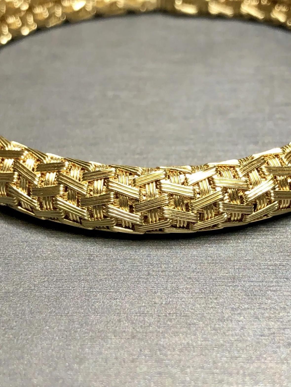 
A finely made bracelet crafted in heavy 18K yellow gold in a gorgeous, detailed weave design. Complete with box clasp and safety.


Dimensions/Weight:

Bracelet measures 7” long and .43” wide and weighs 37.6g.


Condition:

Bracelet is free of any