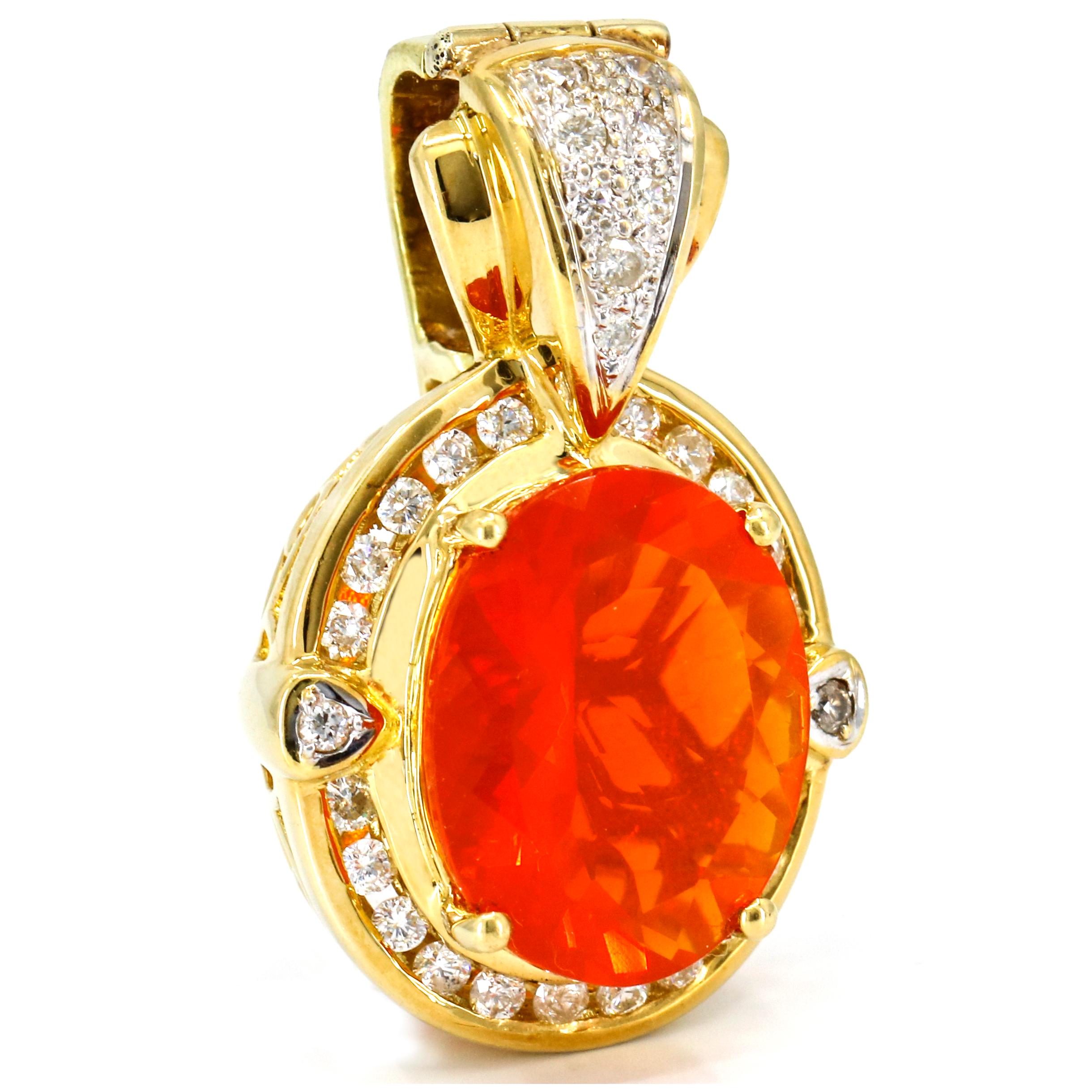 Oval fire opal and diamond pendant with enhancer bail in 18-karat yellow gold. Polished metal setting prong set with a large oval-cut natural opal at center surrounded by numerous round-cut diamonds. 

Height, 18.5mm
Width, 17.5mm
Depth,