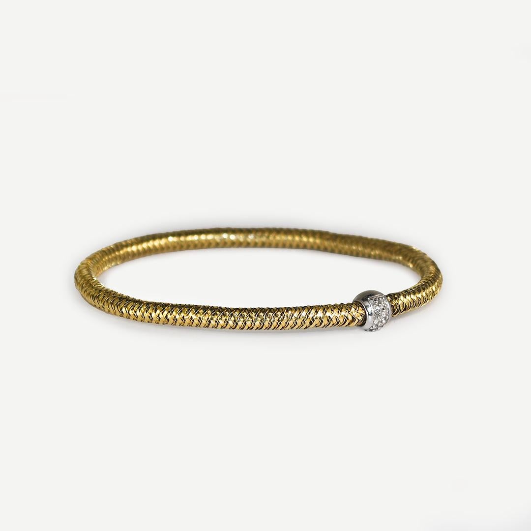 18k yellow gold flex, woven link bangle bracelet.
Stamped 18k Italy 1226V1 on under side of white gold clasp.
The stamping is slightly worn off. 
Similar to designer Roberto Coin jewelry but can't be verified as original.
There is a small lab-grown