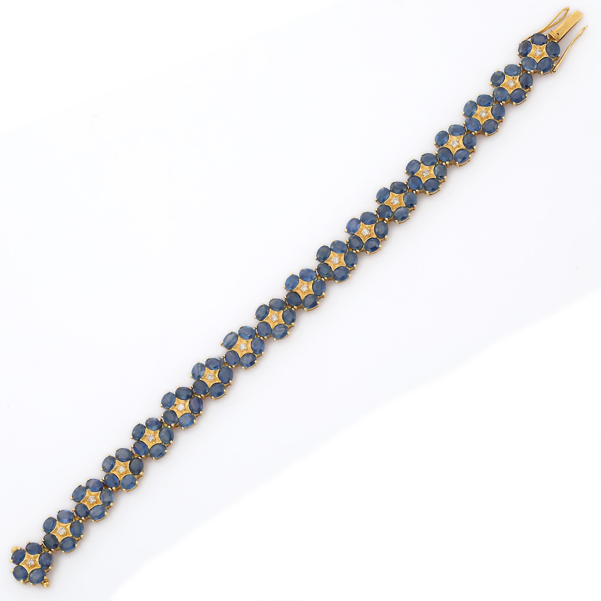 Moderne Bracelet en or jaune 18 carats avec saphirs bleus à fleurs et diamants en vente