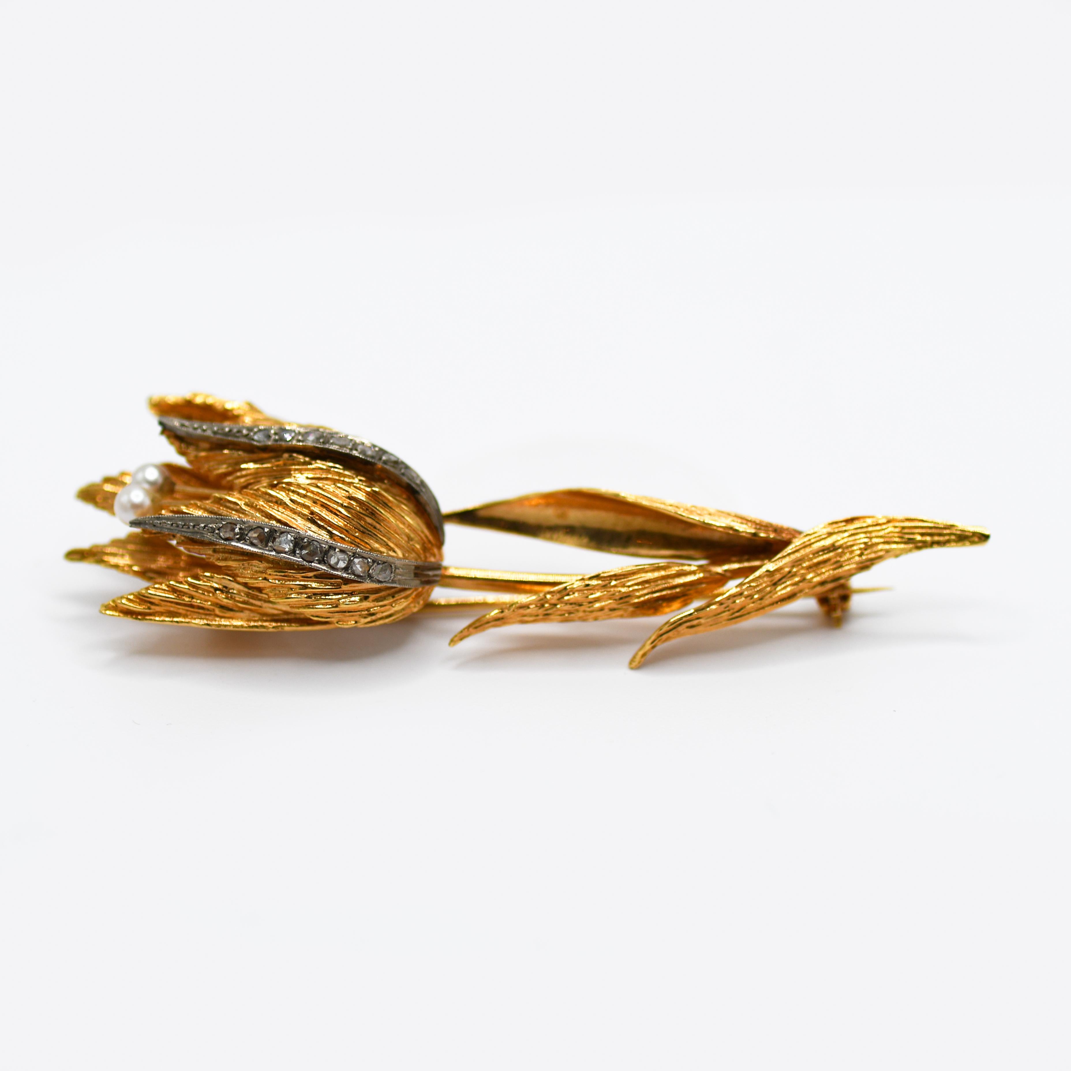 18k Yellow Gold Floral Brooch, 12.1gr
18k yellow gold floral brooch with small rose cut diamonds.
Weighs 12.1gr
2 3/4