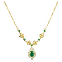 18k Yellow Gold Floral Necklace with Diamonds and Emeralds