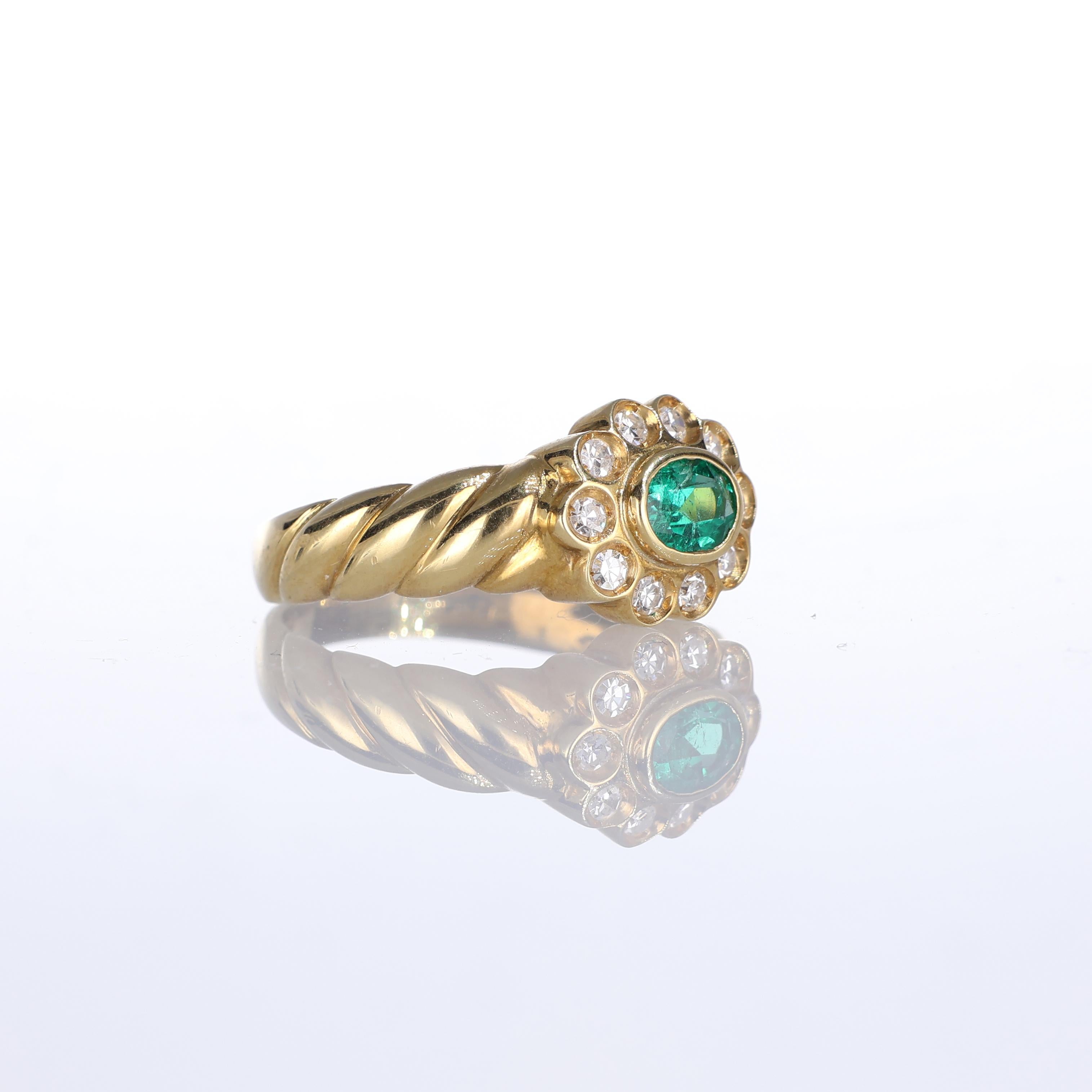 Brilliant Cut 18k Yellow Gold Floral Ring with Oval Emerald and Diamond Halo For Sale