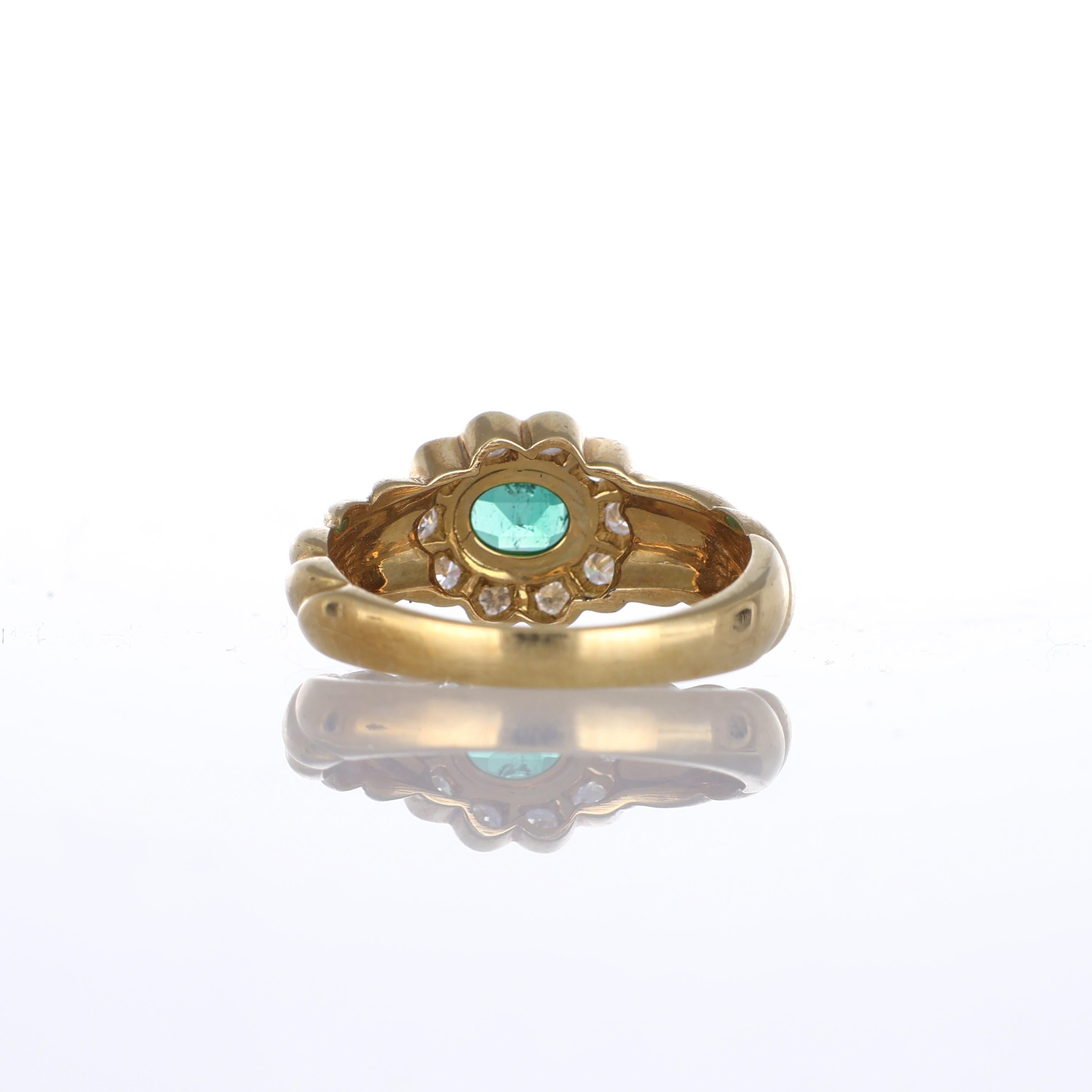 Women's or Men's 18k Yellow Gold Floral Ring with Oval Emerald and Diamond Halo For Sale