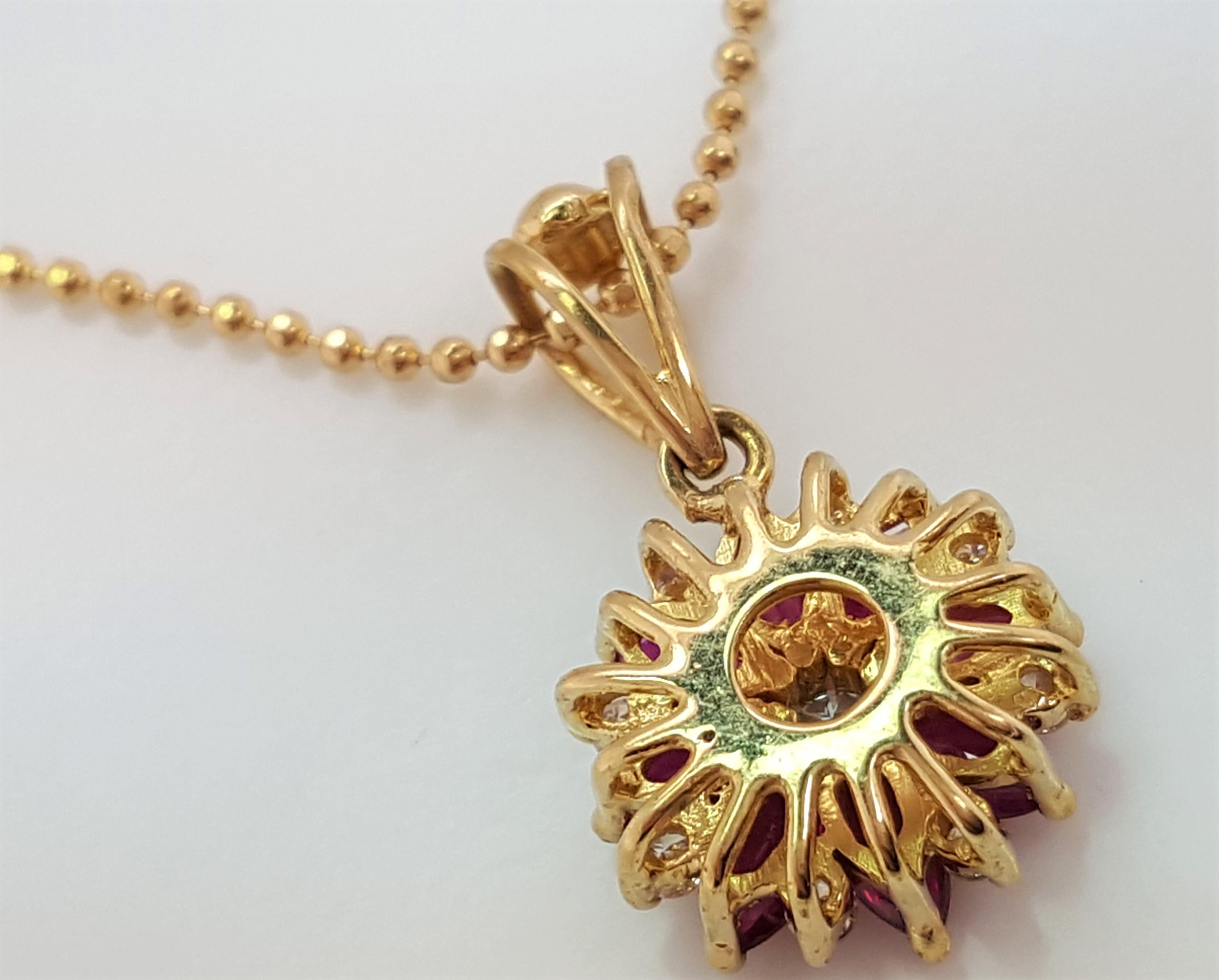 Modern 18 Karat Yellow Gold Flower Motif Diamond and Ruby Pendant with Chain For Sale