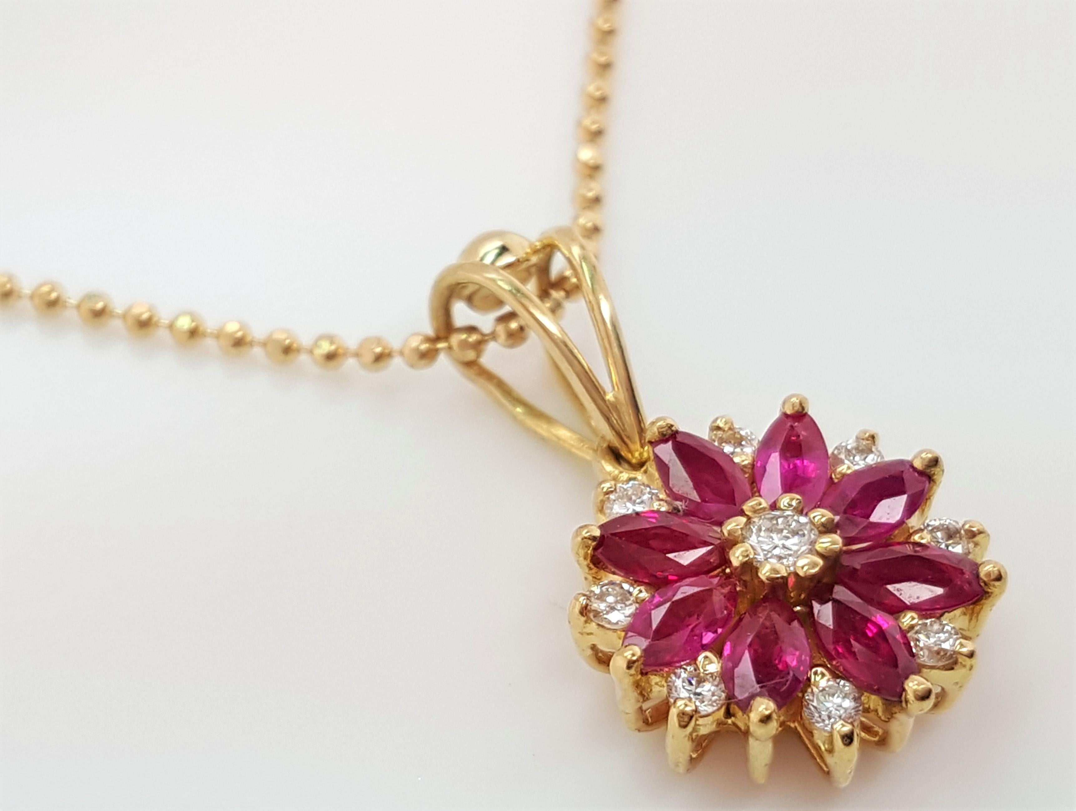 Marquise Cut 18 Karat Yellow Gold Flower Motif Diamond and Ruby Pendant with Chain For Sale