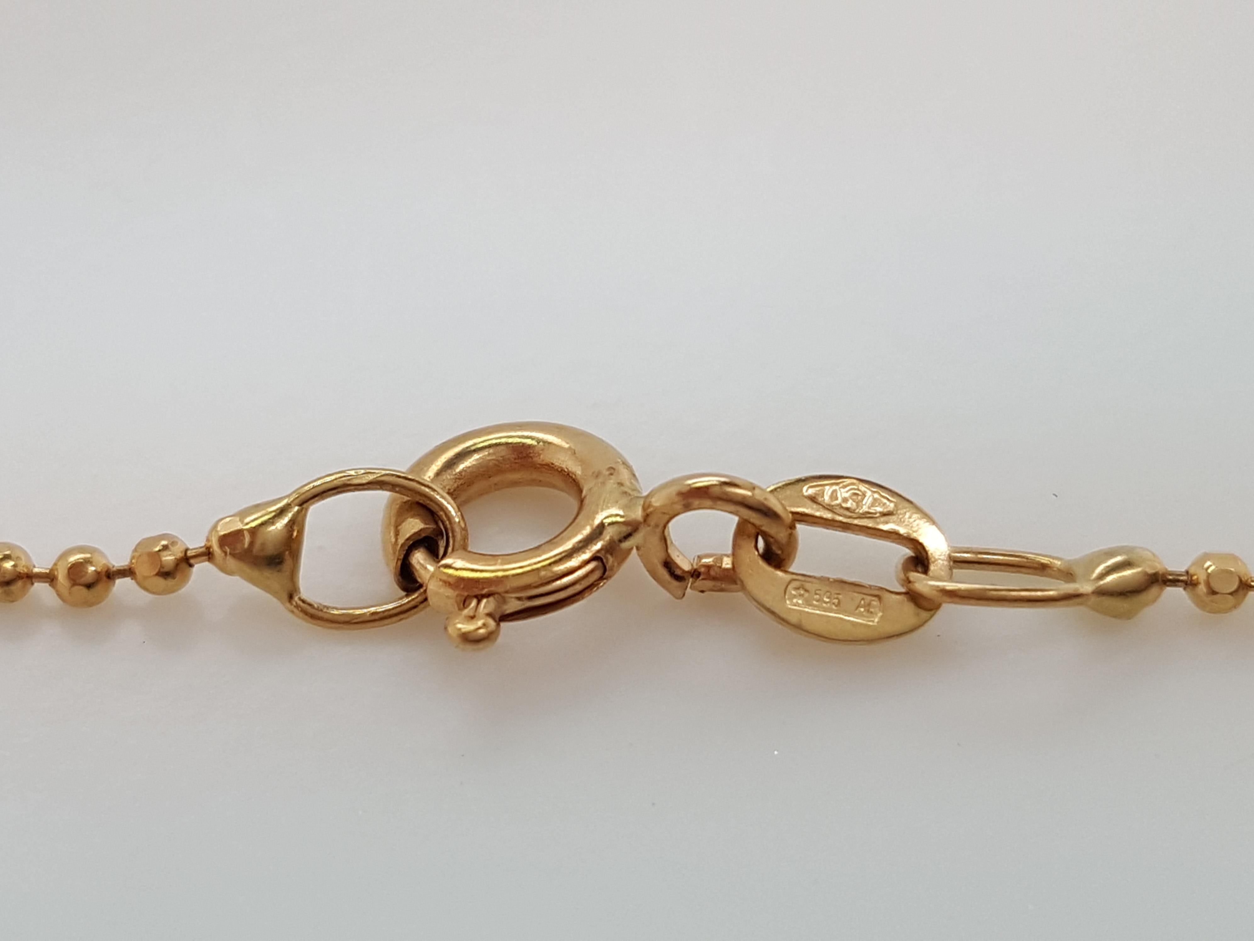 Pendentif à motif de fleurs en or jaune 18 carats avec chaîne et diamants et rubis en vente 2