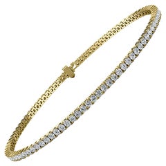 Bracelet tennis à quatre griffes en or jaune 18 carats avec diamants (2 ct. tw)