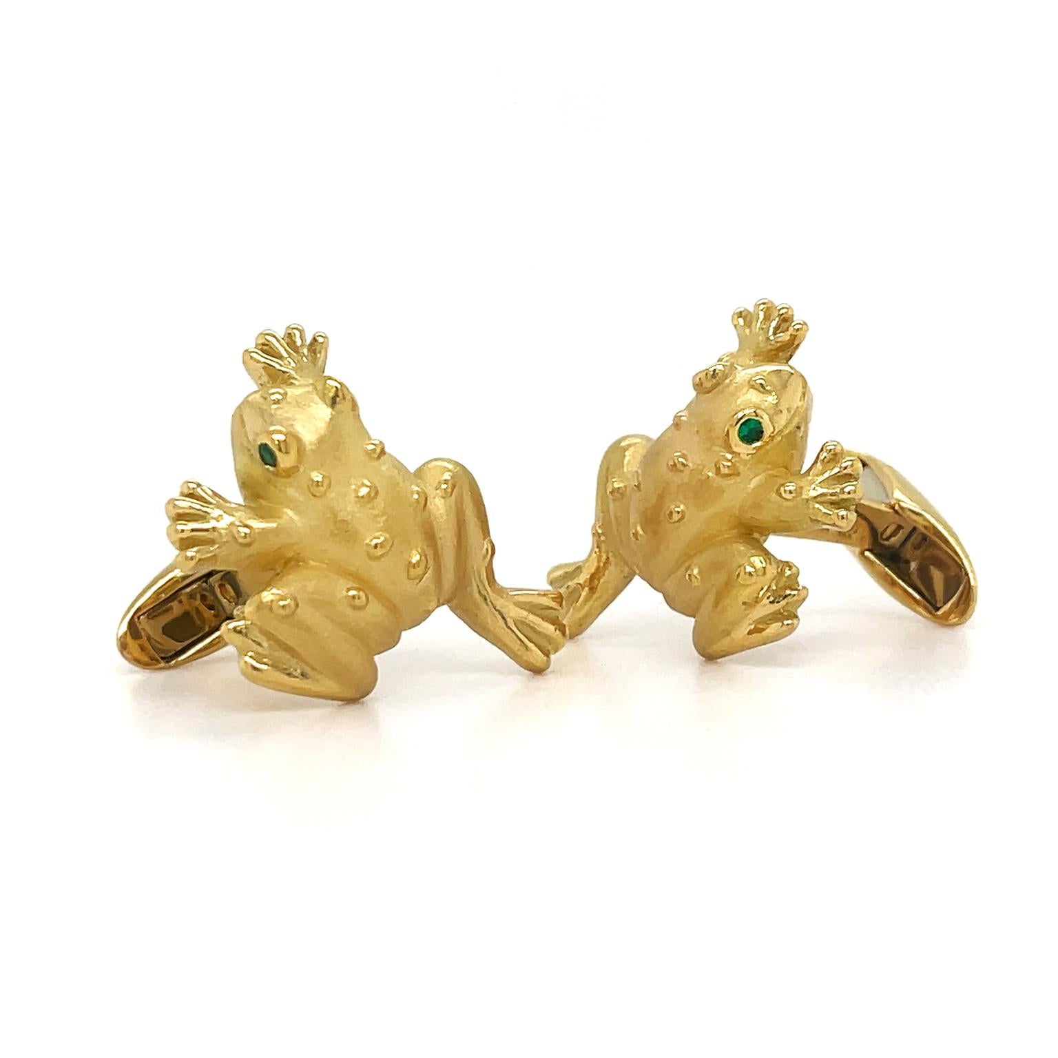 Frogs sculpted in 18k yellow gold scintillate as cufflinks. Detailing includes their webbed feet in motion and raised mounds for their eyes. A fixed bar and swivel toggle secure the cufflinks, which measure 0.95 inches (width) by 0.87 inches