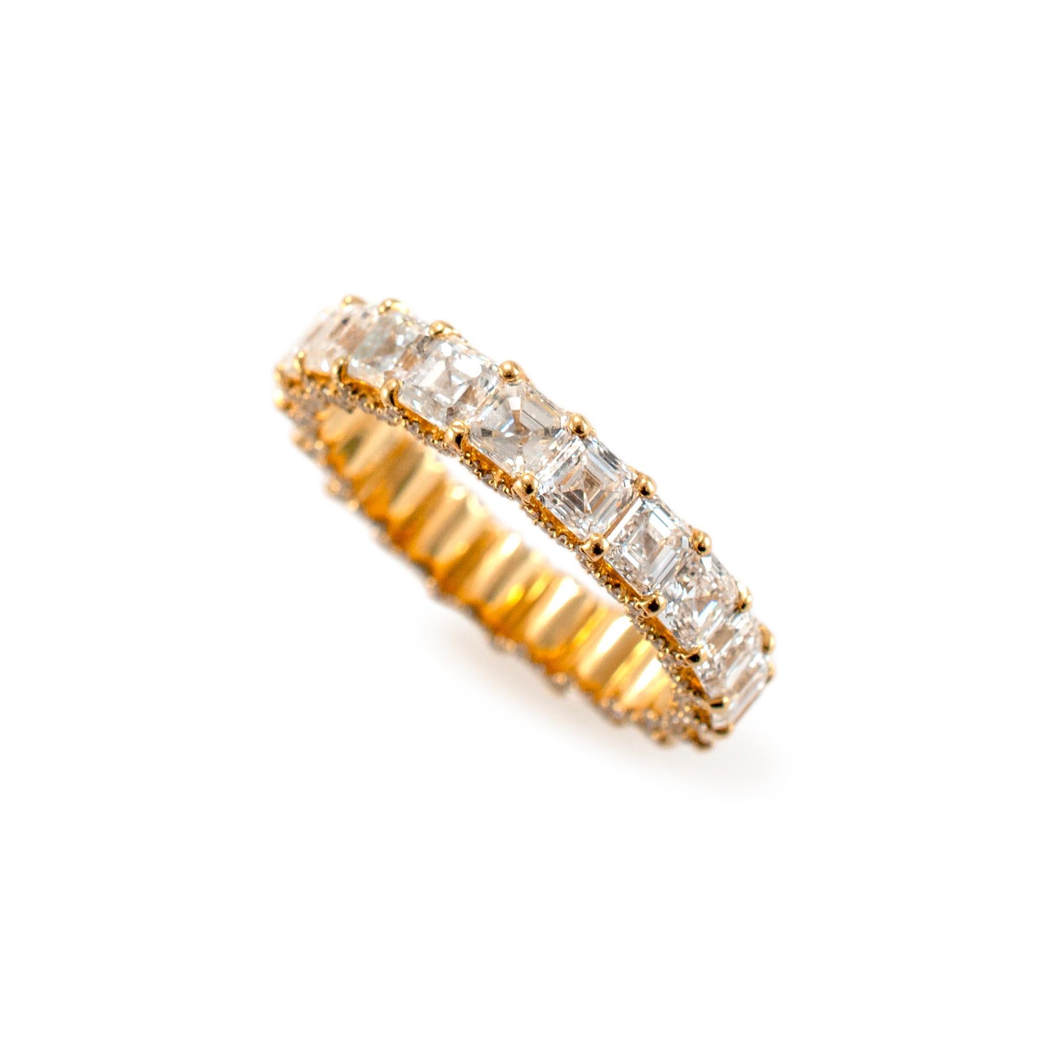 Gender: Ladies

Metal Type: 18K Yellow Gold

Ring Size: 6.5

Length: 6.5 inches

Width: 3.90 mm

Weight: 3.64 grams

18K Yellow Gold comfort-fit diamond wedding eternity band with a half-round shank. The metal was tested and determined to be 18K