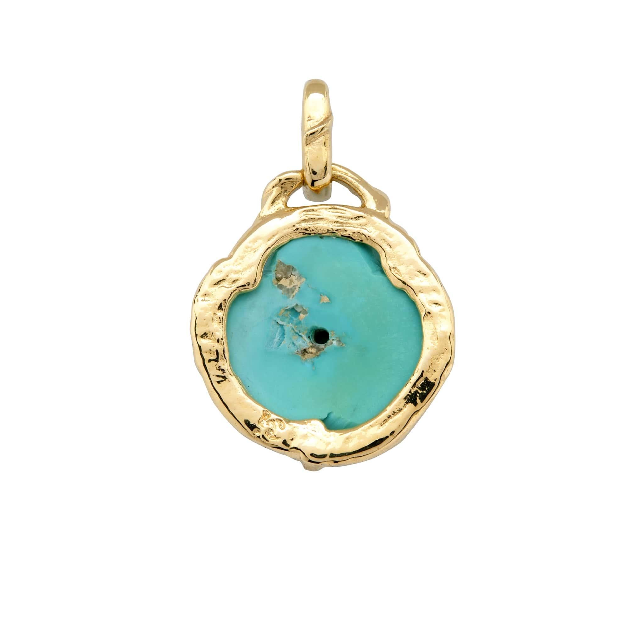Our poetic Gabrielle charm pendant features a carved rosebud in American Turquoise from the Sleeping Beauty Mine in Arizona.  This gemstone carving is set in an organic weathered texture 14k yellow gold design with thorny claws and is suspended from