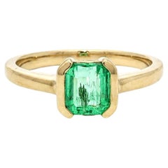Solitaire-Ring aus 18 Karat Gelbgold mit einem GIA-zertifizierten, ölfreien Smaragd aus Kolumbien (0,97 Karat) in halber Fassung