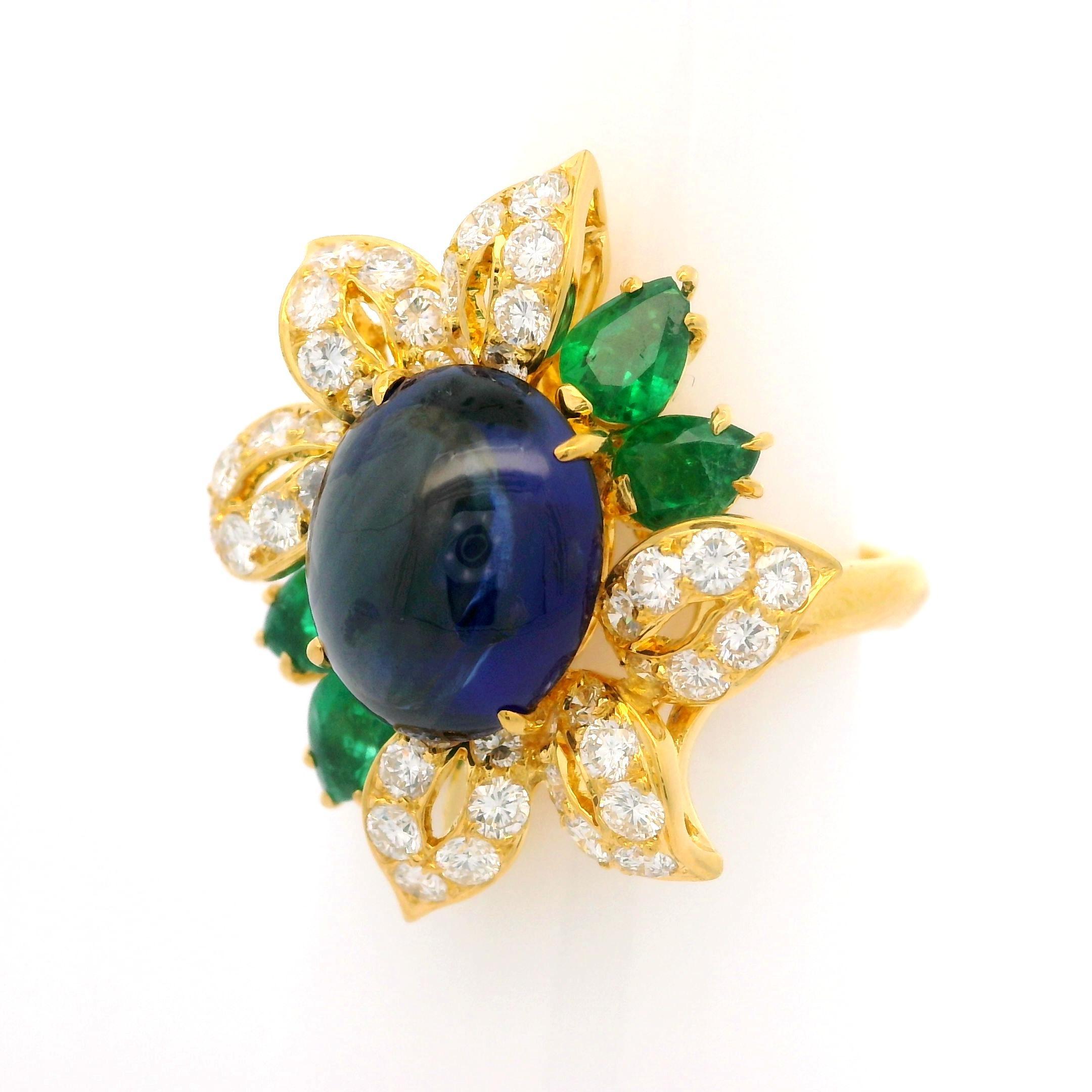 --Stone(s):--
(1) Natural Genuine Sapphire - Oval Cabochon Cut - Prong Set - True Clean Royal Blue Color - 5.22ct (exact)
** See Certification Details Below for Complete Info **
(4) Natural Genuine Emeralds - Pear Cut - Prong Set - Vivid Green Color