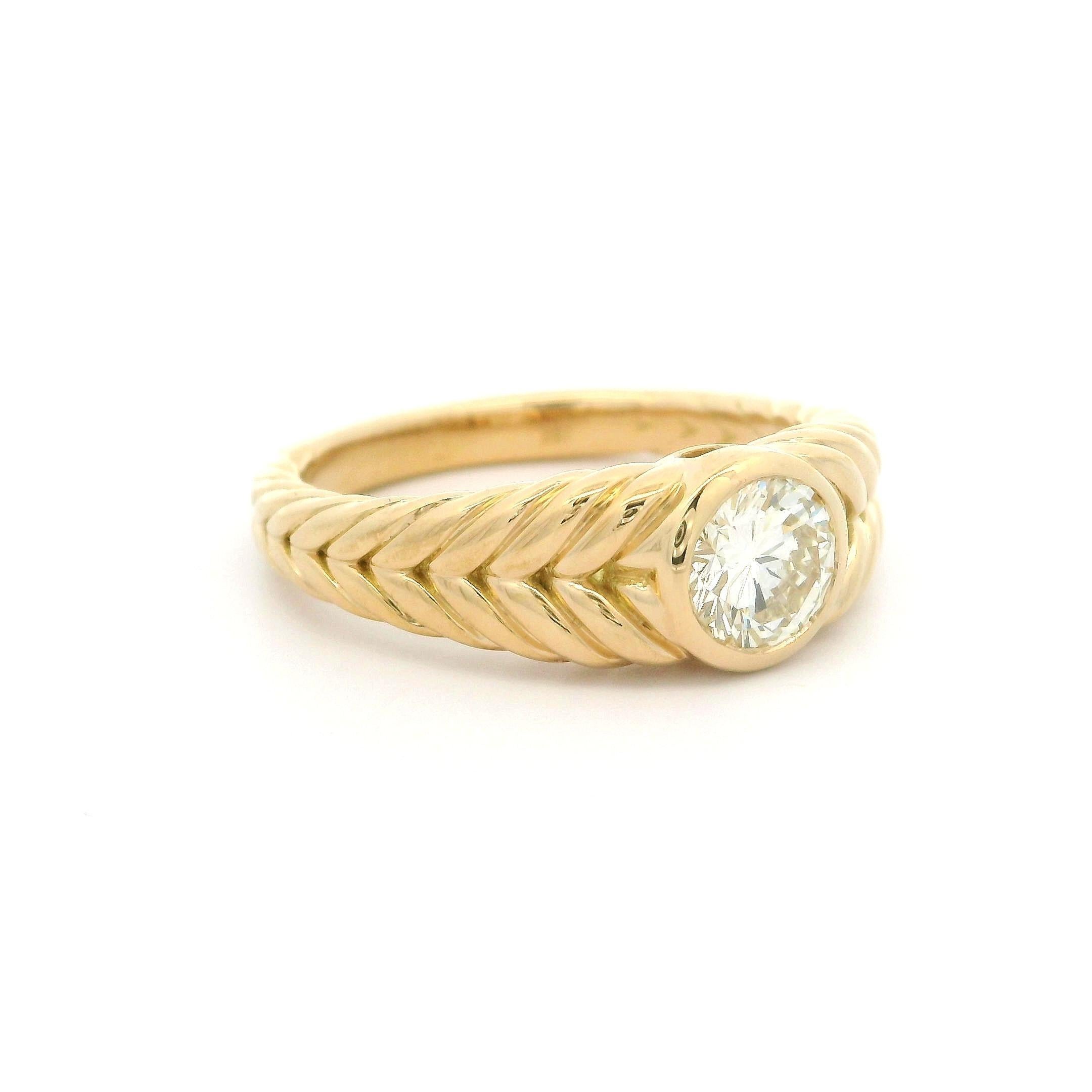--Pierre(s) :...
(1) Diamant naturel véritable - taille ronde et brillante - serti - couleur L - pureté VVS2 - 0,75ct (exact - certifié)
** Voir les détails de la certification ci-dessous pour des informations complètes

MATERIAL : Or jaune 18k