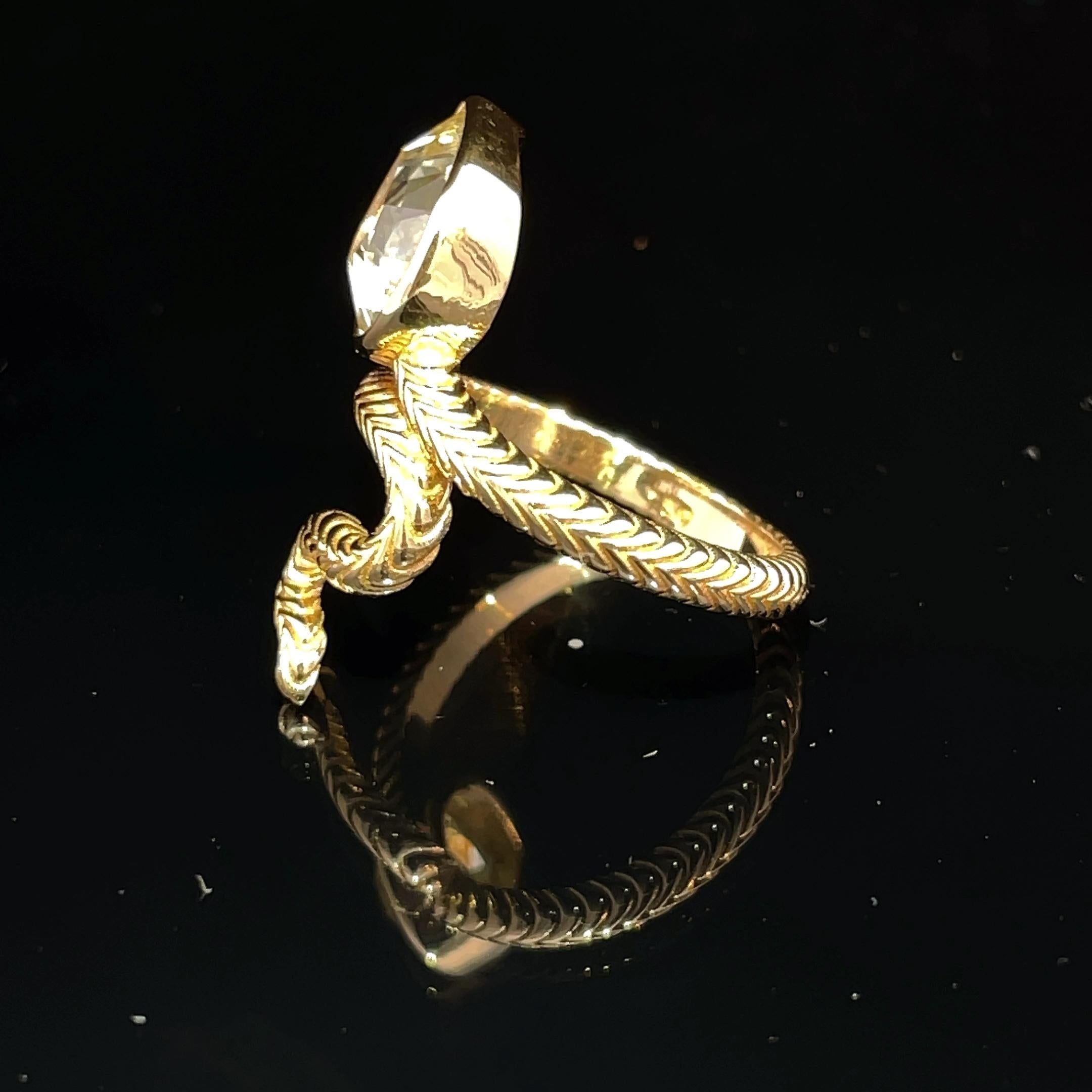 Discover the exquisite allure of our 18k Yellow Gold Snake Ring, a stunning piece that seamlessly blends elegance with a touch of the wild. This captivating ring features a beautifully crafted snake design, symbolizing transformation and rebirth,