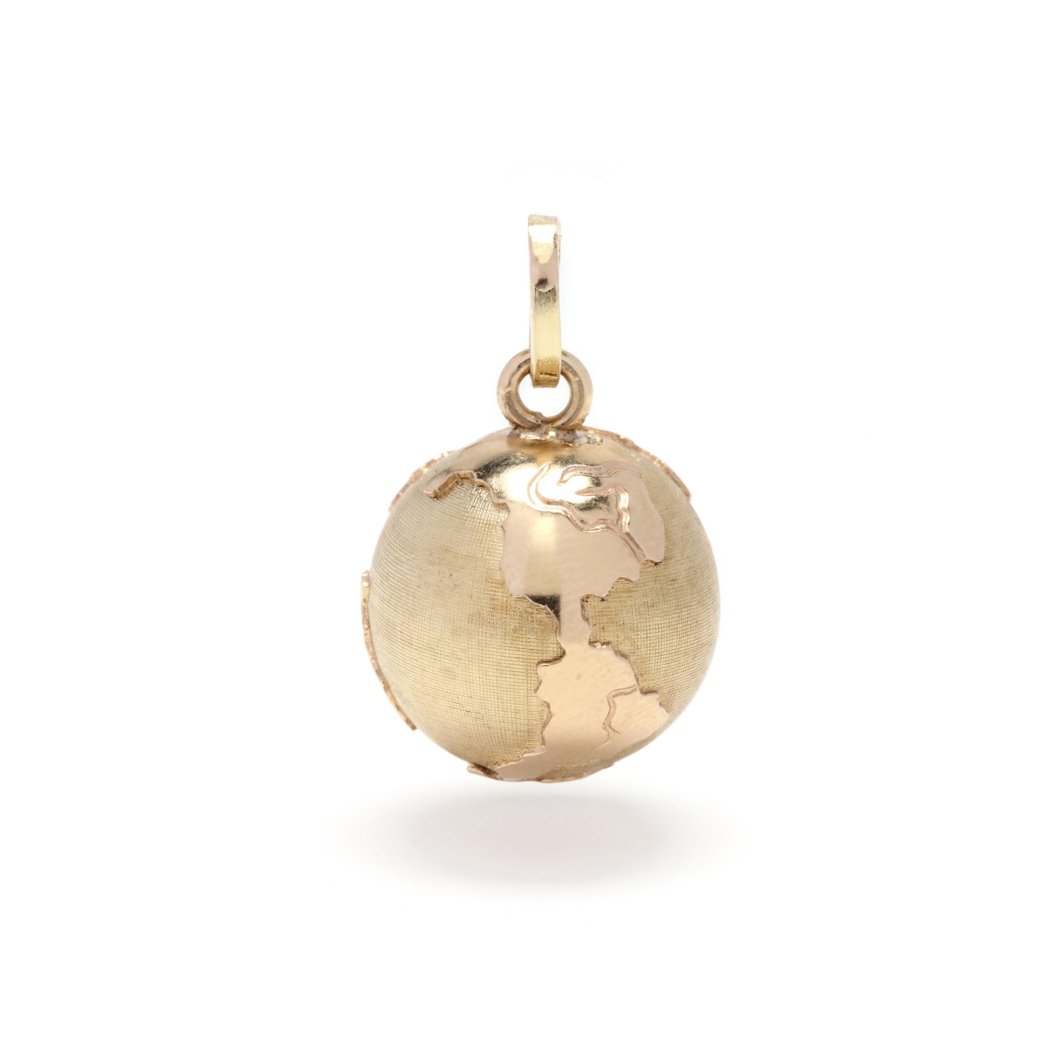 A vintage 18 karat yellow gold globe charm. This charm features a spherical design with applied gold creating the continents and an oval bail.



Length: 1 in.



Width: 3/4 in.



Weight: 3.1 dwts.