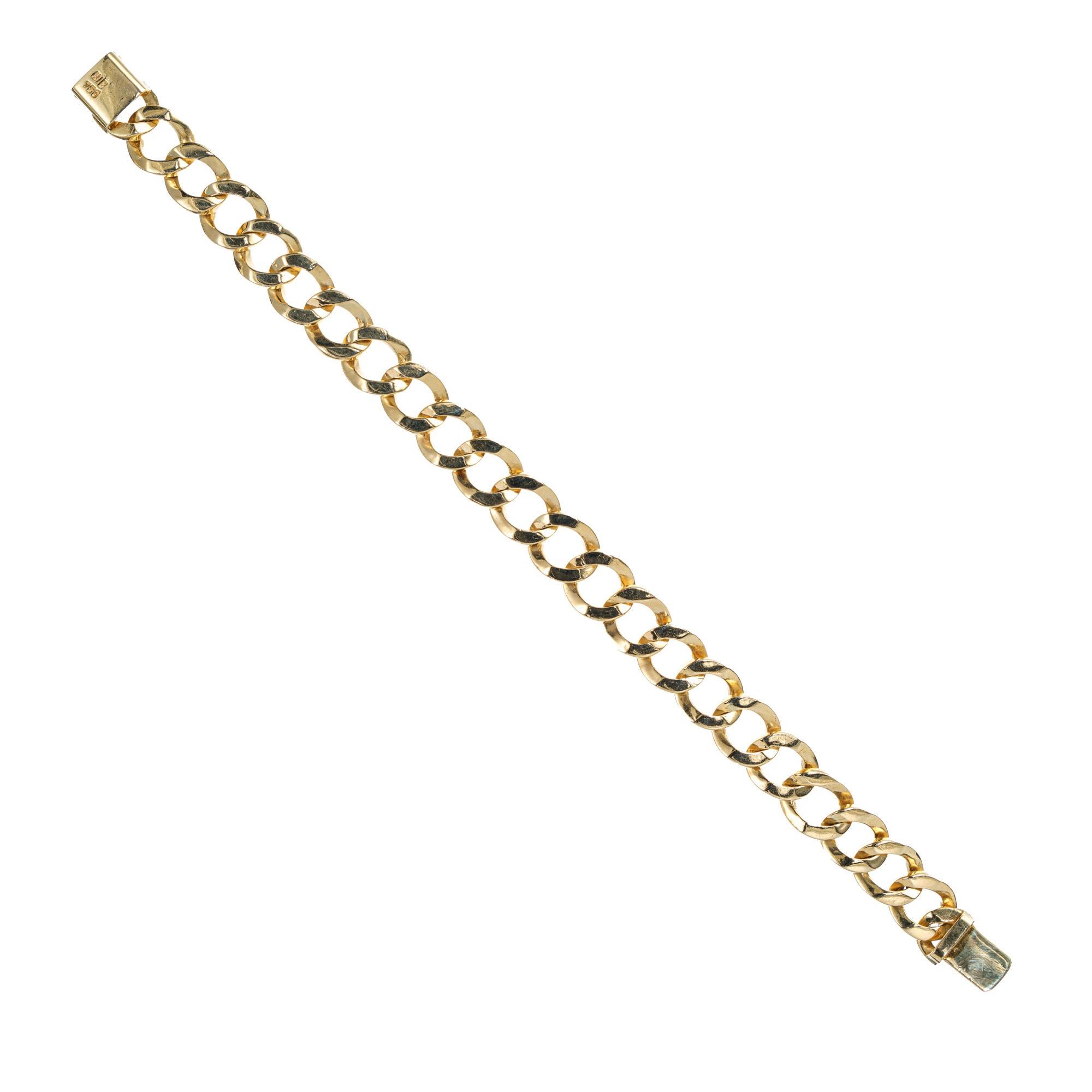 1970's 11mm wide heavy solid 18k gold rounded curb link bracelet. 7.5 inches long

18k yellow gold 
Stamped: 750
44.9 grams
Bracelet: 7.5 Inches
Width: 11mm
Thickness/depth: 3.3mm
