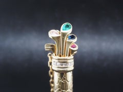 18K Yellow Gold Golf Caddy Pendant with Emeralds, Sapphire, Diamond and Ruby.