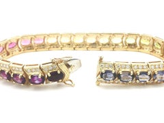 Armband aus 18-karätigem Gelbgold mit Farbverlauf, Edelsteinen, Diamantrand und Chevron-Gliedern