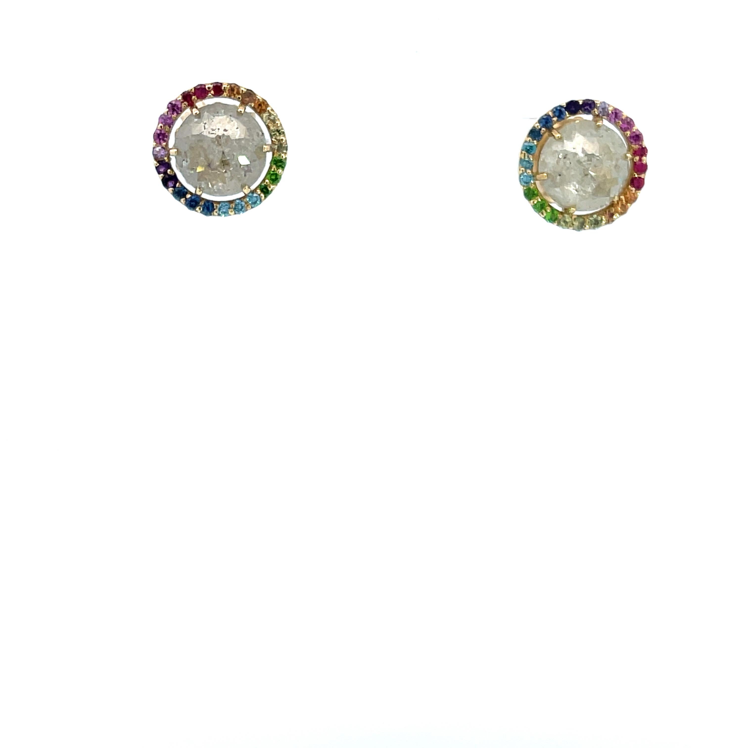 A pair of 18k yellow gold 4.58 total carat weight grey diamond stud earrings with a rainbow halo consisting of .48 total carat weight pink sapphires, orange sapphires, yellow sapphires, blue sapphires, purple sapphires, rubies, tsavorite garnets and