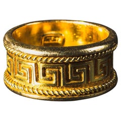 Bague en or jaune 18k avec clé grecque