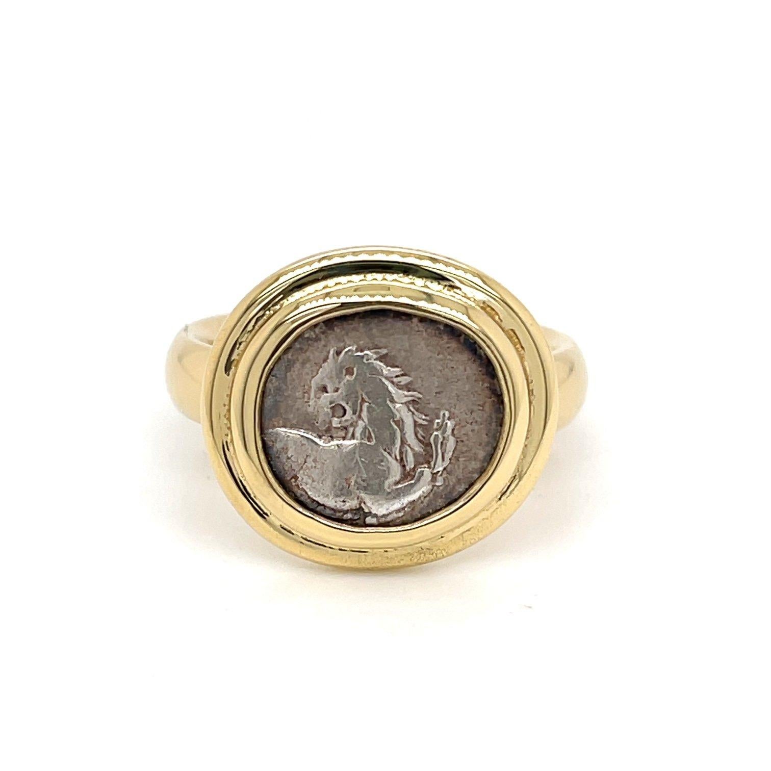 An 18k yellow gold ring set with one Greek lion coin ( Thrace, Chersonesos). Ring size 8. This ring was made an designed by llyn strong.