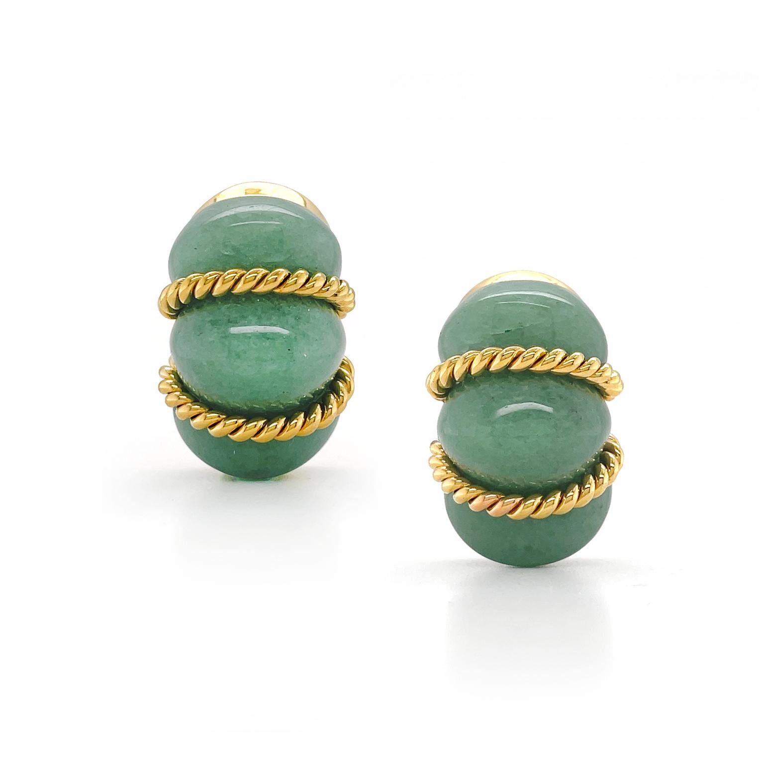 Crystalline quartz of green aventurine reinvents shrimp earrings accented by 18k yellow gold. Green Aventurine is carved into a shrimp motif of three raised structures, totaling two carats, while braids of bright 18k yellow gold rest in the valleys.