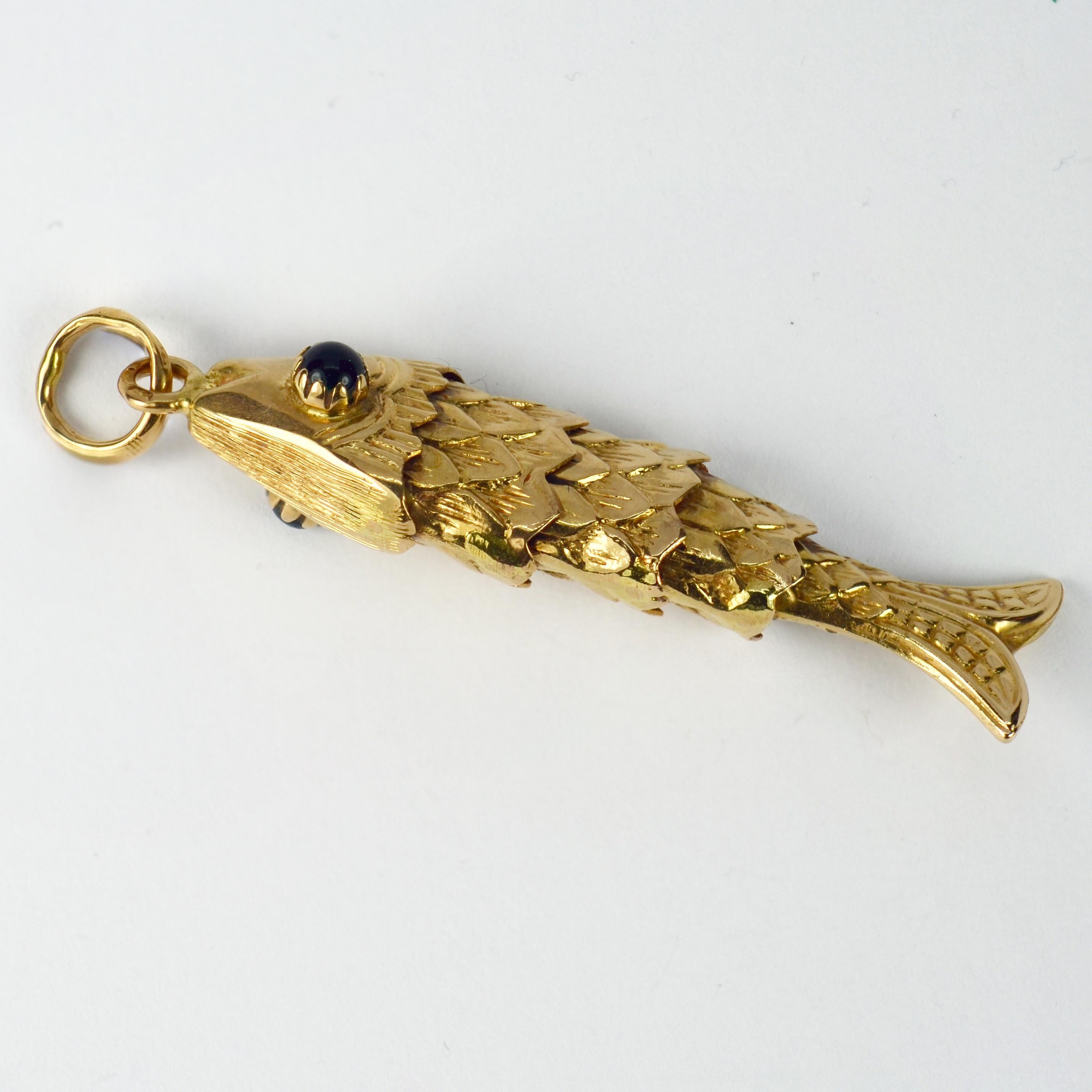 gold articulated fish pendant