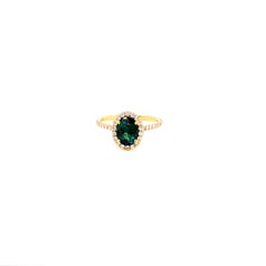 18 Karat Yellow Gold Green Tourmaline Ring with Diamond Halo