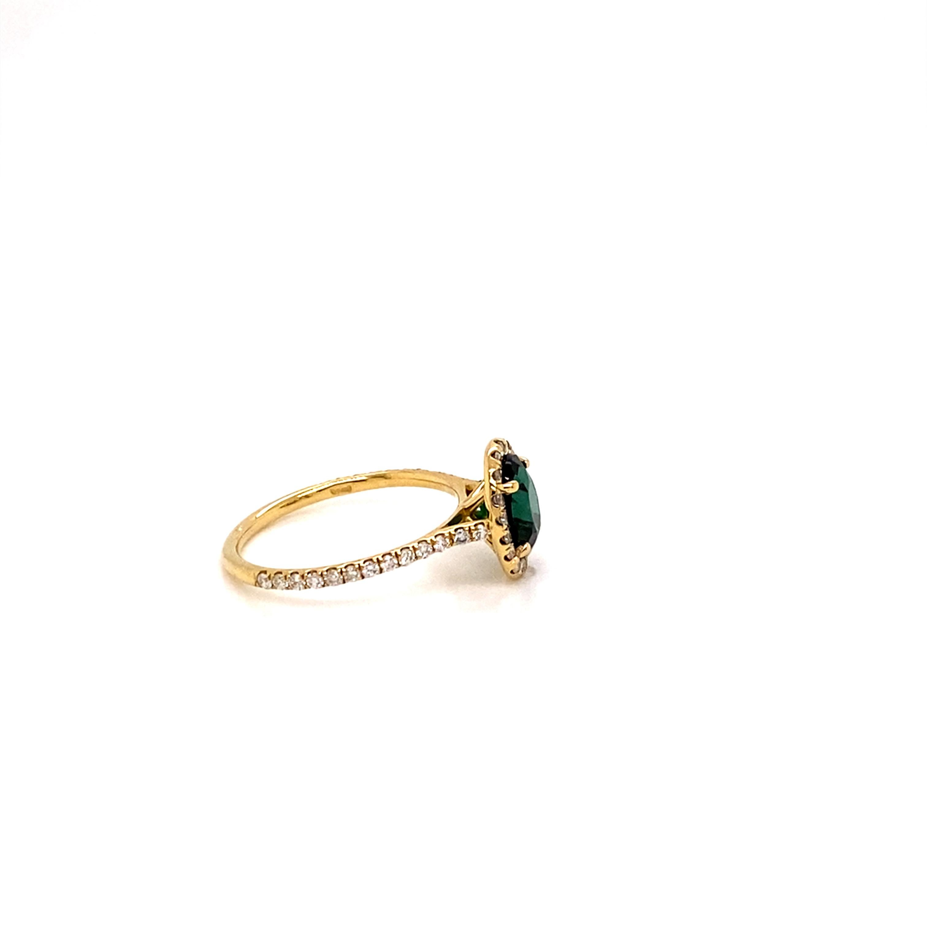 Oval Cut 18 Karat Yellow Gold Green Tourmaline Ring with Diamond Halo For Sale